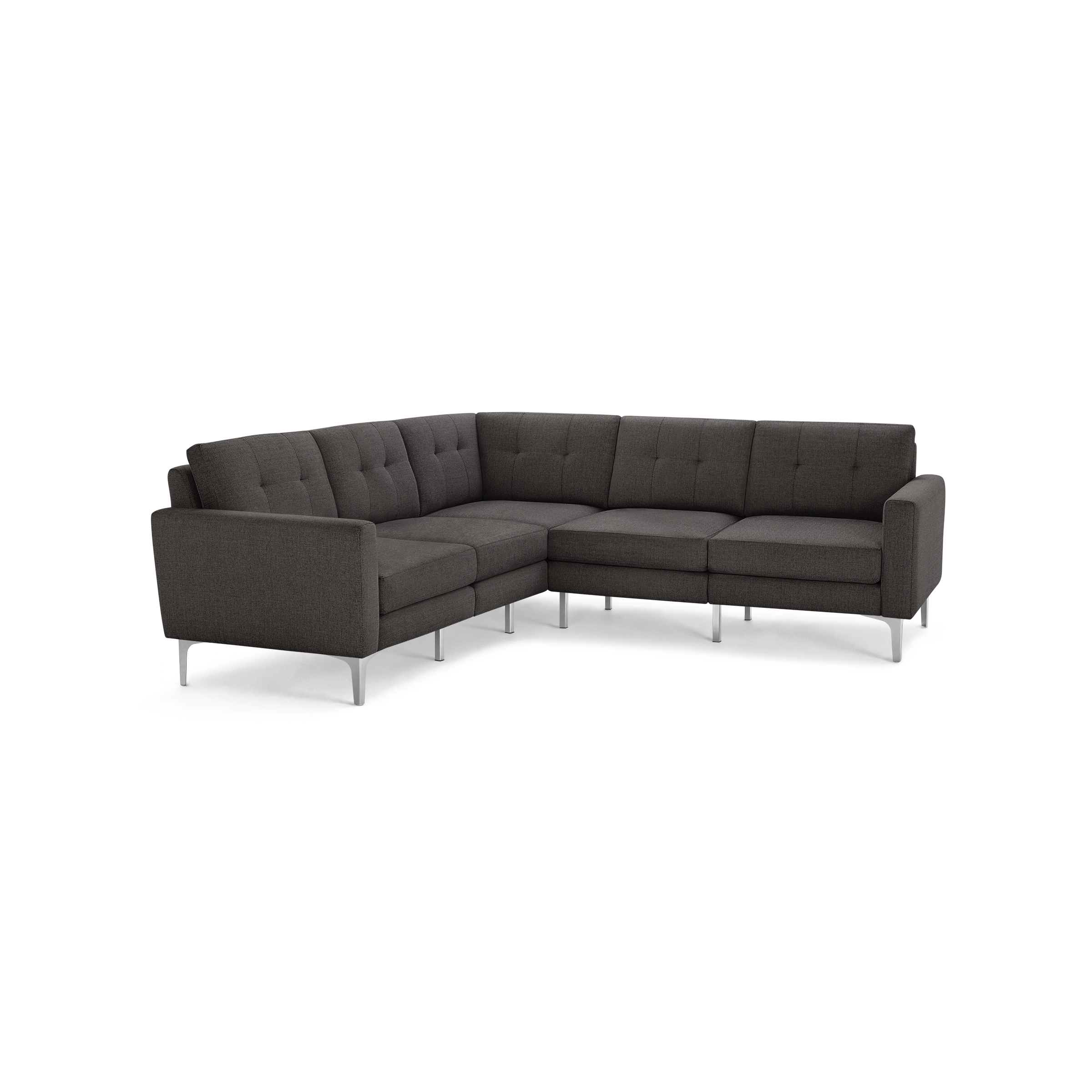 Dark gray upholstered L-shaped sectional sofa with tufted back cushions and sleek silver metal legs on a black background.
