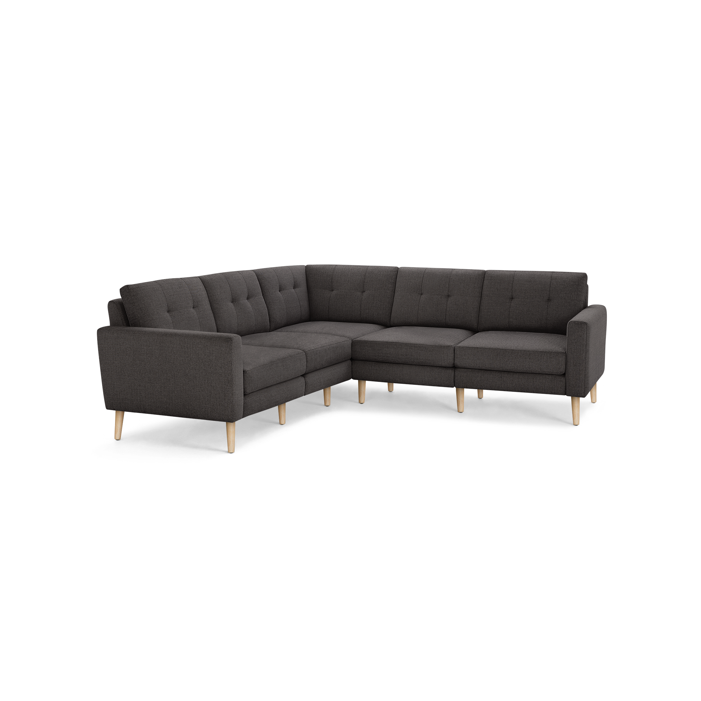 Dark gray fabric L-shaped sectional sofa with tufted back cushions and light wooden legs, modern minimalist design.