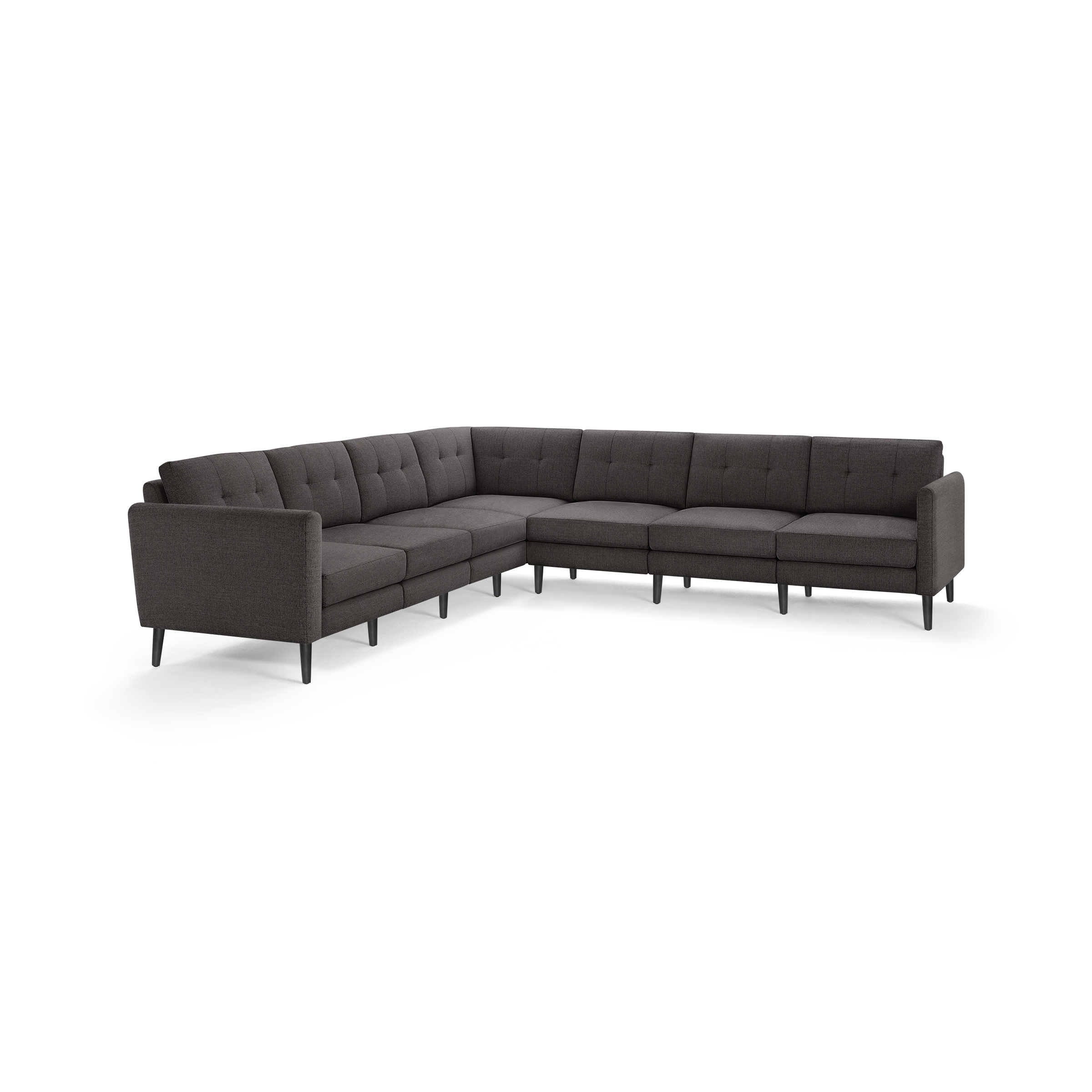 Dark gray fabric L-shaped sectional sofa with tufted back cushions and slim black legs, designed for modern living spaces.