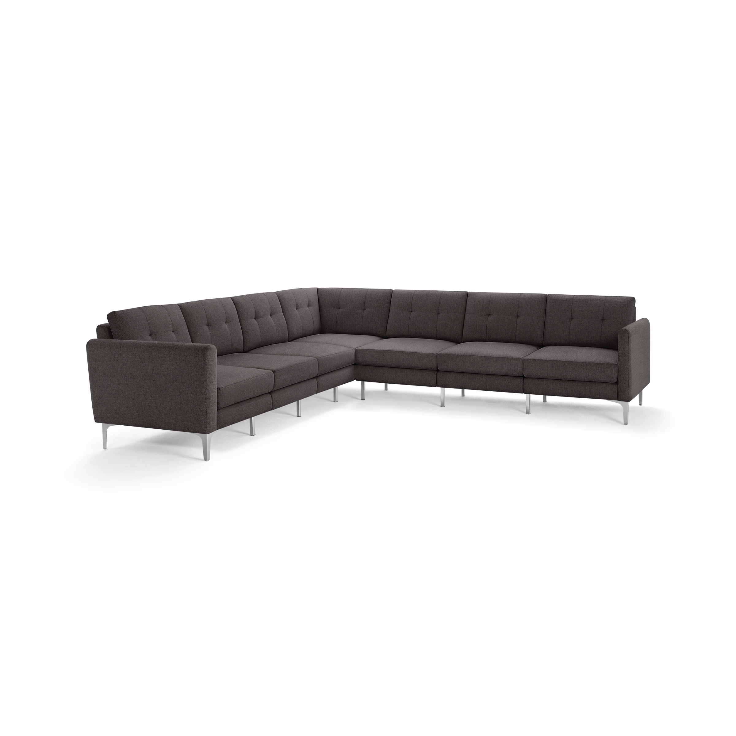 Modern dark gray upholstered L-shaped sectional sofa with tufted back cushions and slim metal legs.