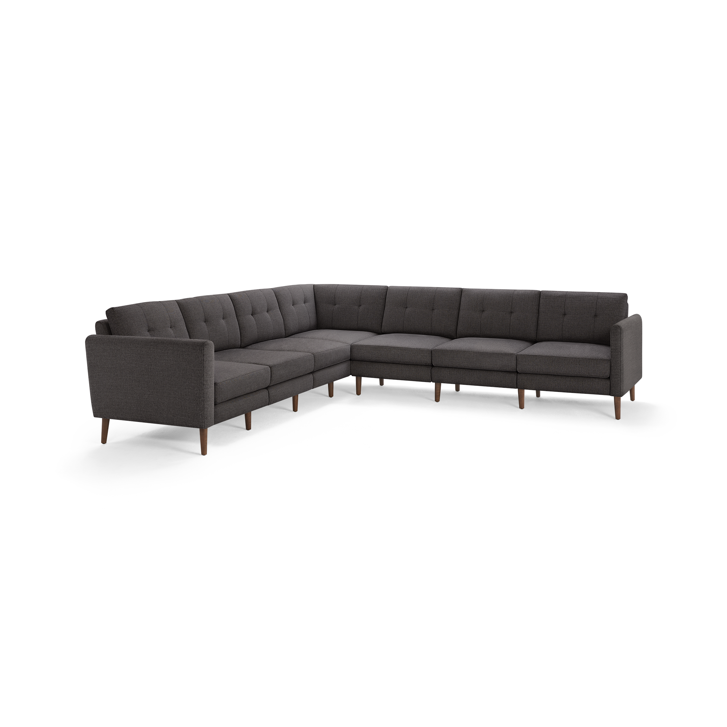Dark gray L-shaped sectional sofa with tufted cushions and wooden tapered legs, designed for spacious seating and modern style.
