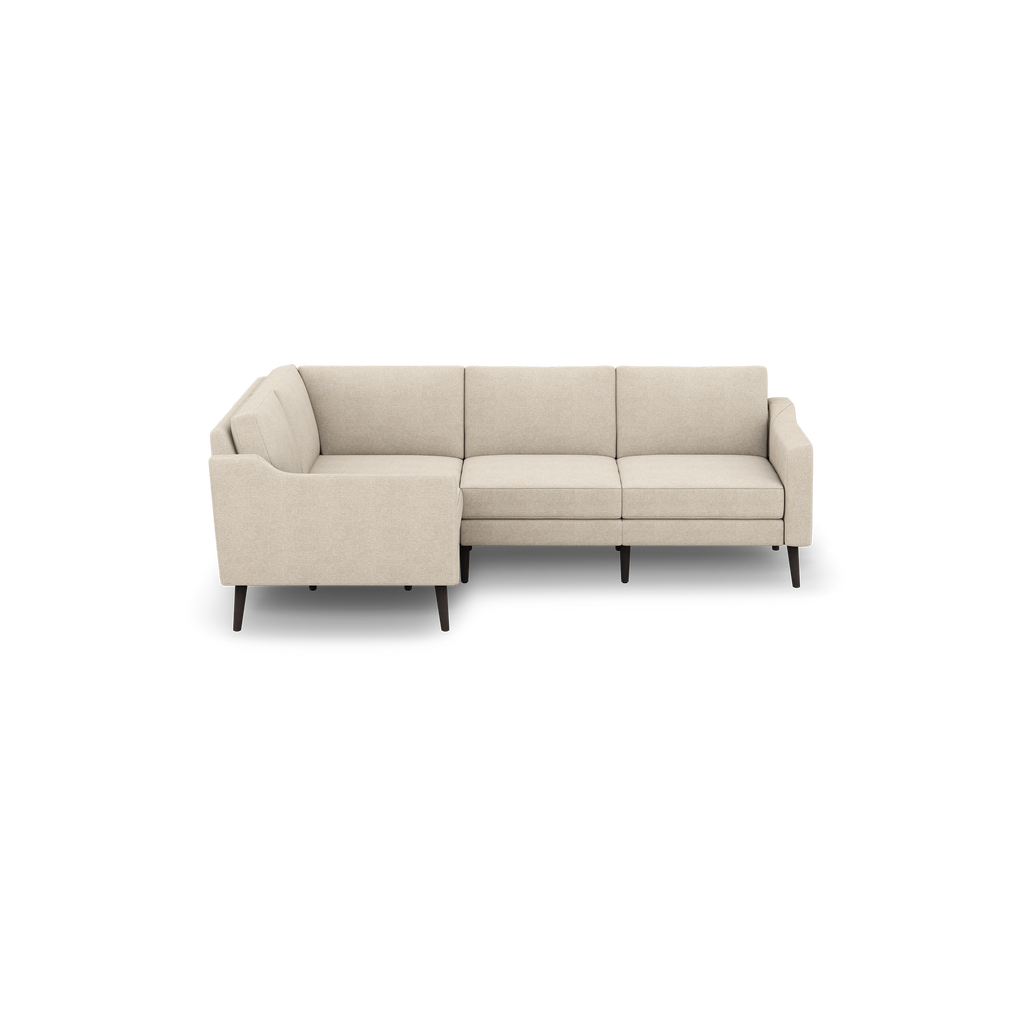 Beige L-shaped fabric sectional sofa with padded cushions and dark wooden legs, designed for modern living rooms.