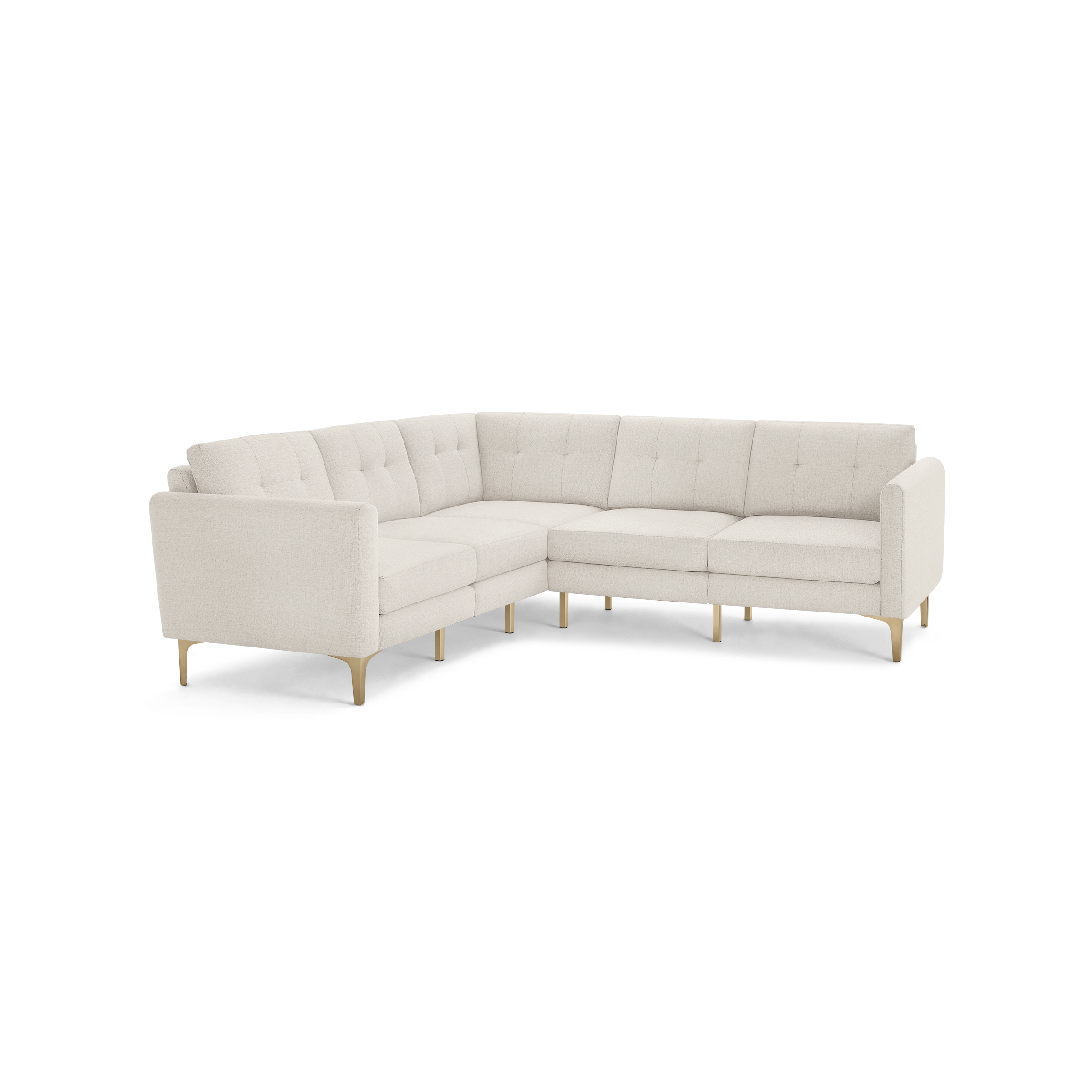Cream-colored L-shaped sectional sofa with tufted cushions and wooden legs, featuring clean lines and modern design.