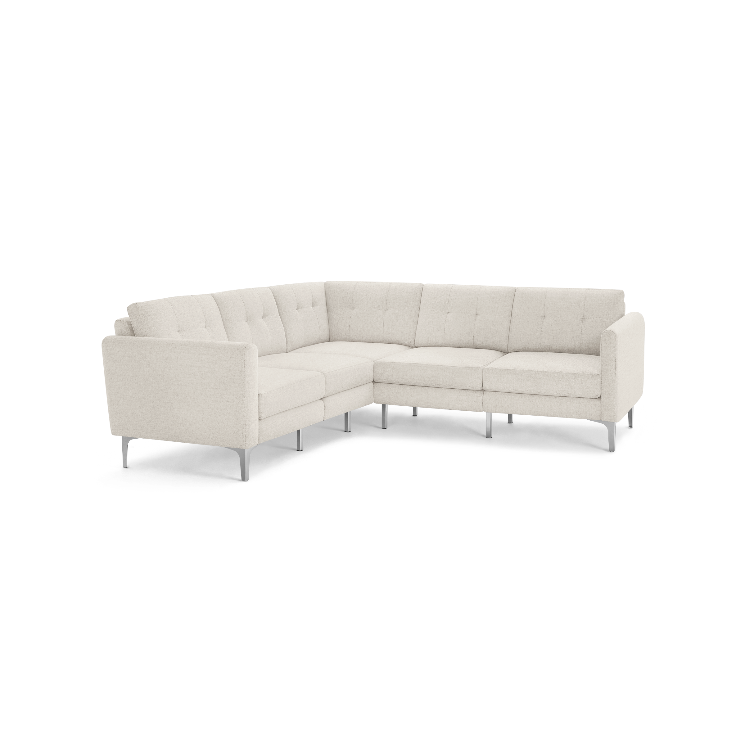 Light beige L-shaped sectional sofa with tufted back cushions and sleek metal legs on a plain background.