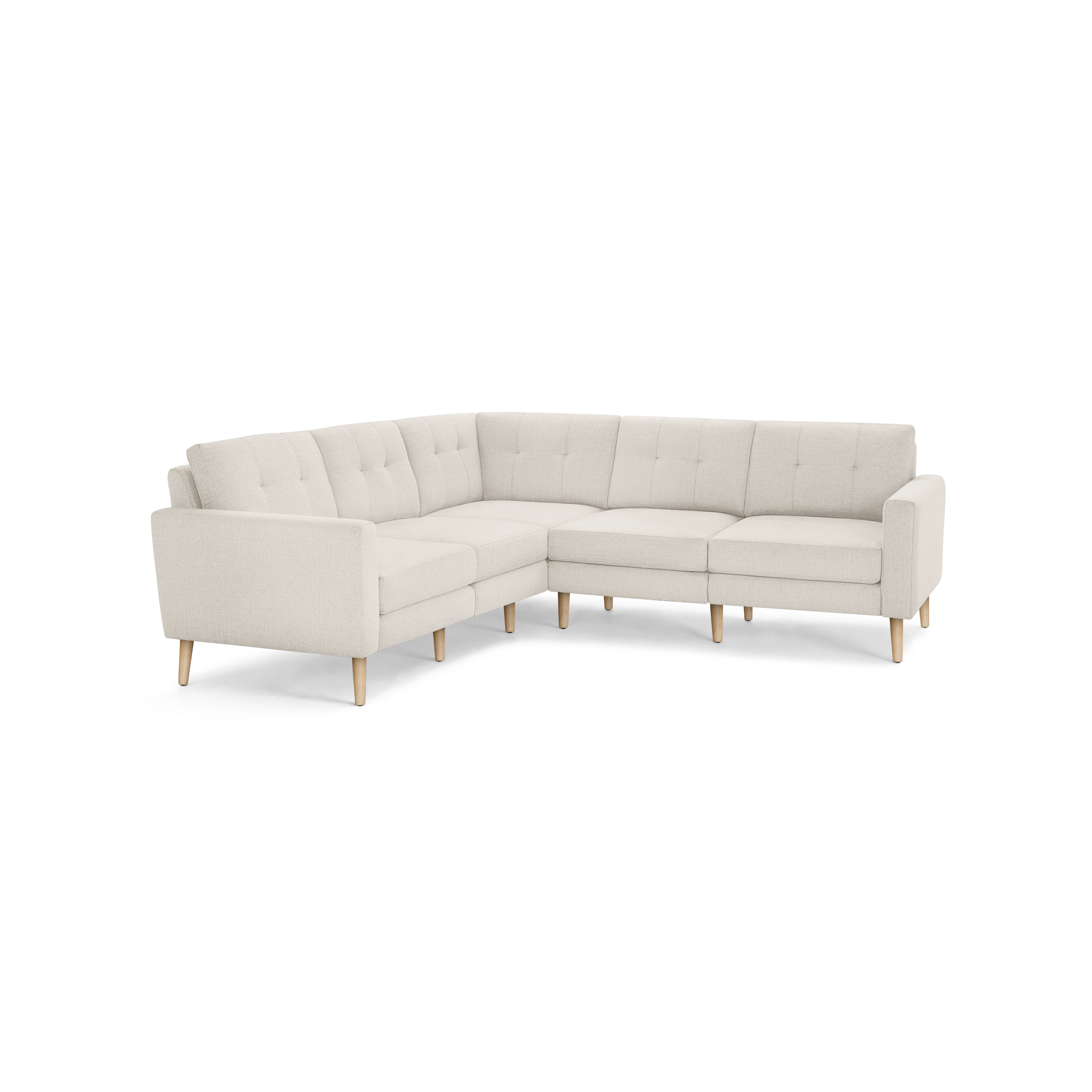 Light beige L-shaped sectional sofa with tufted back cushions and wooden tapered legs, modern and minimalist design.
