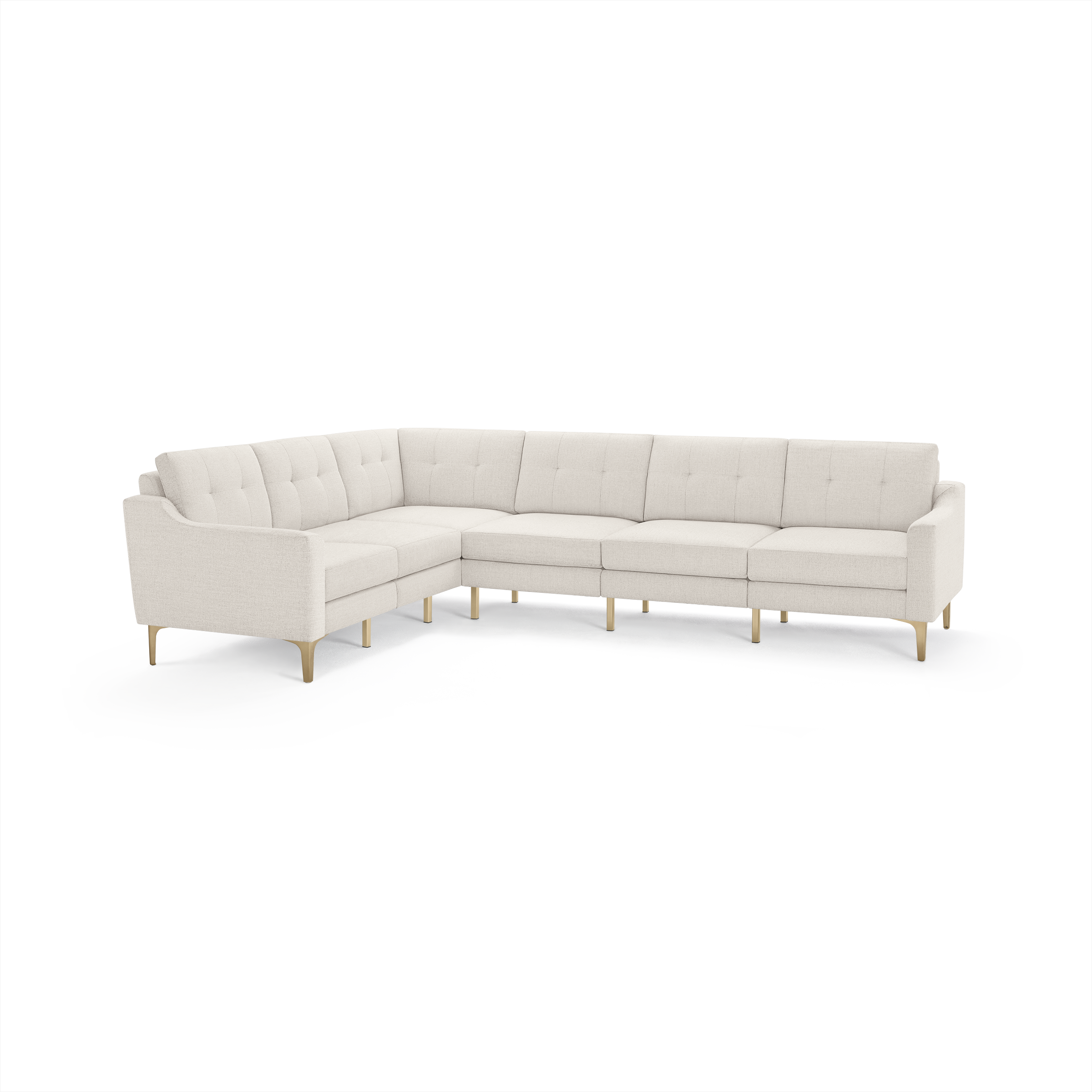 Modern L-shaped sectional sofa with cream-colored tufted fabric upholstery and light wooden legs.