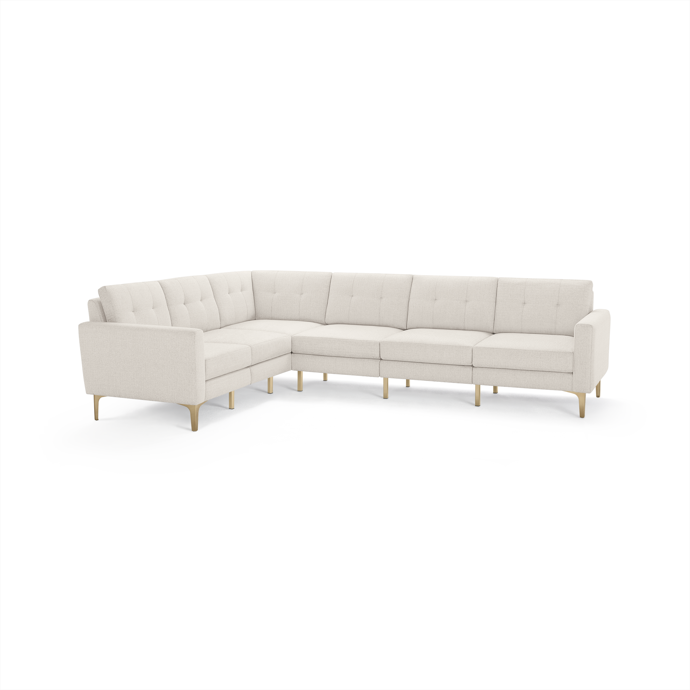 Light beige L-shaped sectional sofa with tufted back cushions, slim armrests, and wooden legs.
