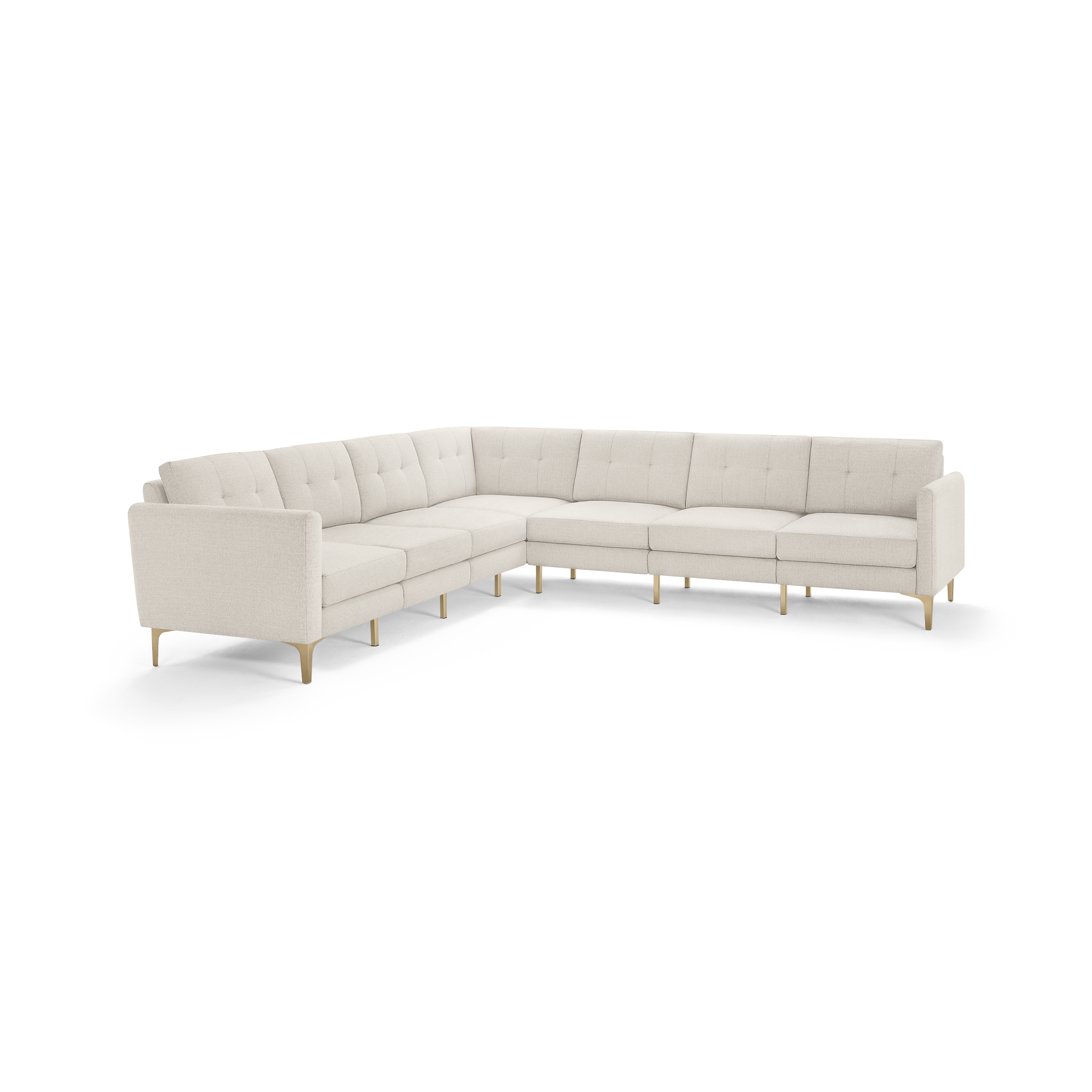 Light beige L-shaped sectional sofa with tufted back cushions and slim wooden legs, featuring clean, modern design.