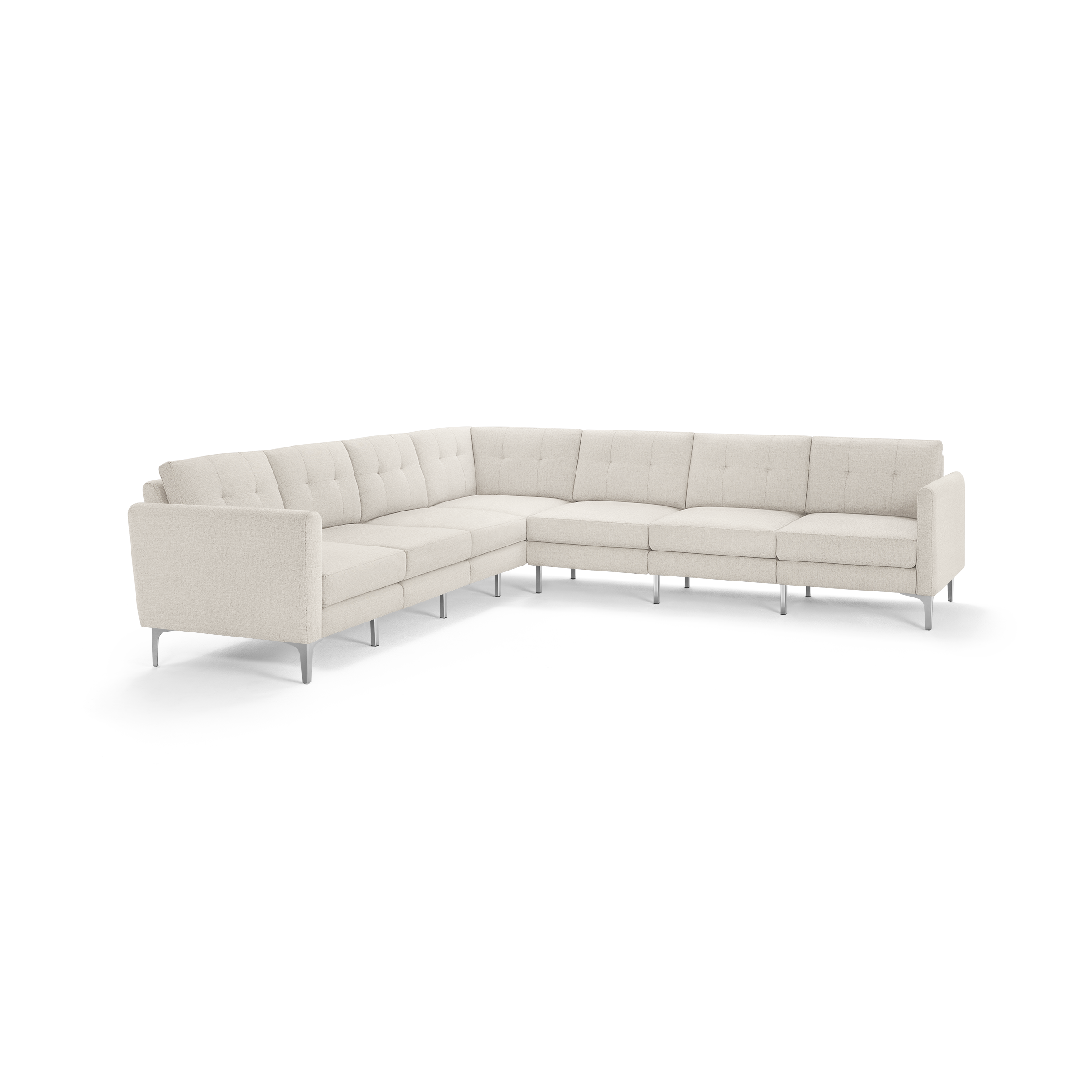 Large L-shaped sectional sofa with beige fabric upholstery, tufted back cushions, and sleek metal legs, modern minimalist design.