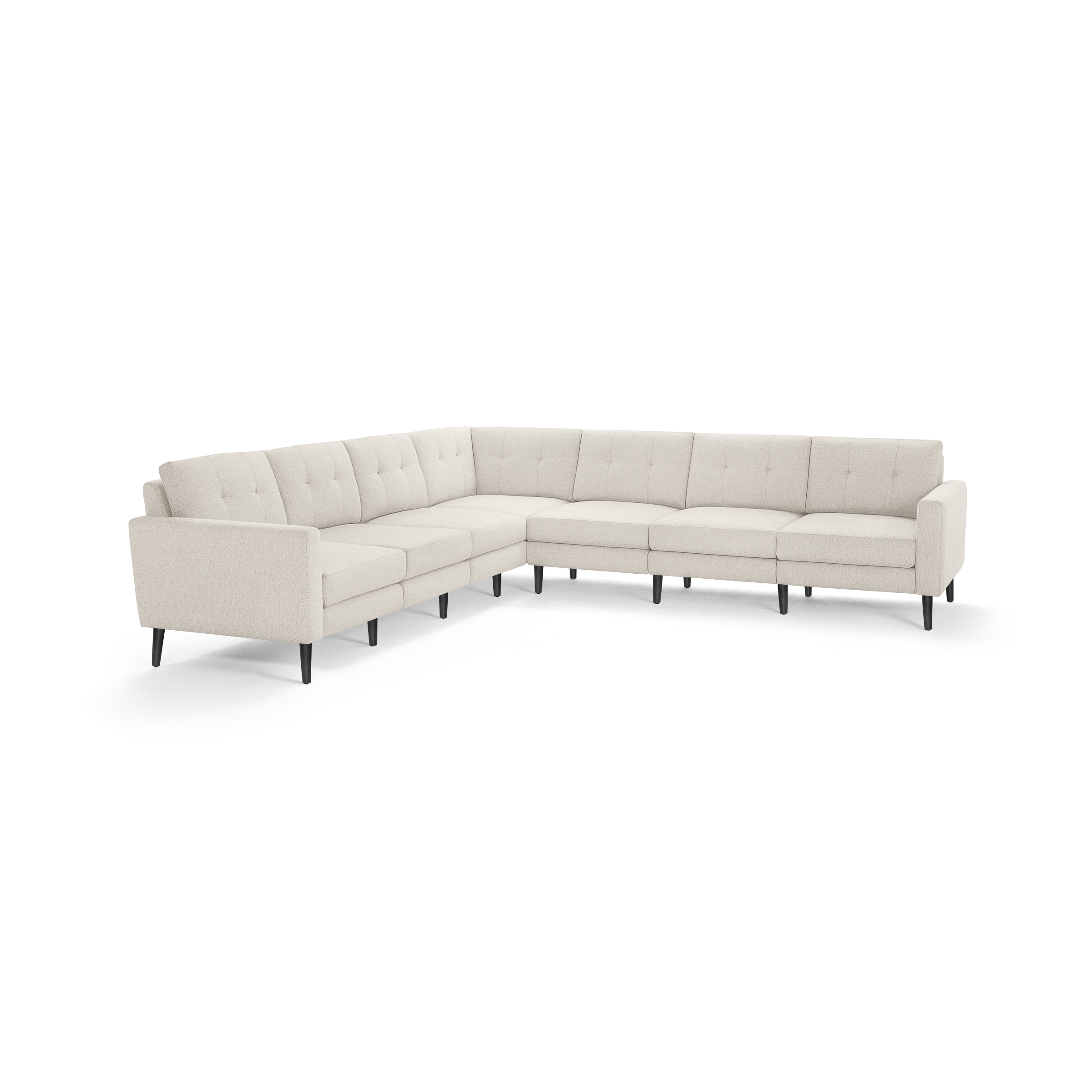 Beige fabric sectional sofa with tufted cushions, straight armrests, and slender black legs in an L-shaped configuration.