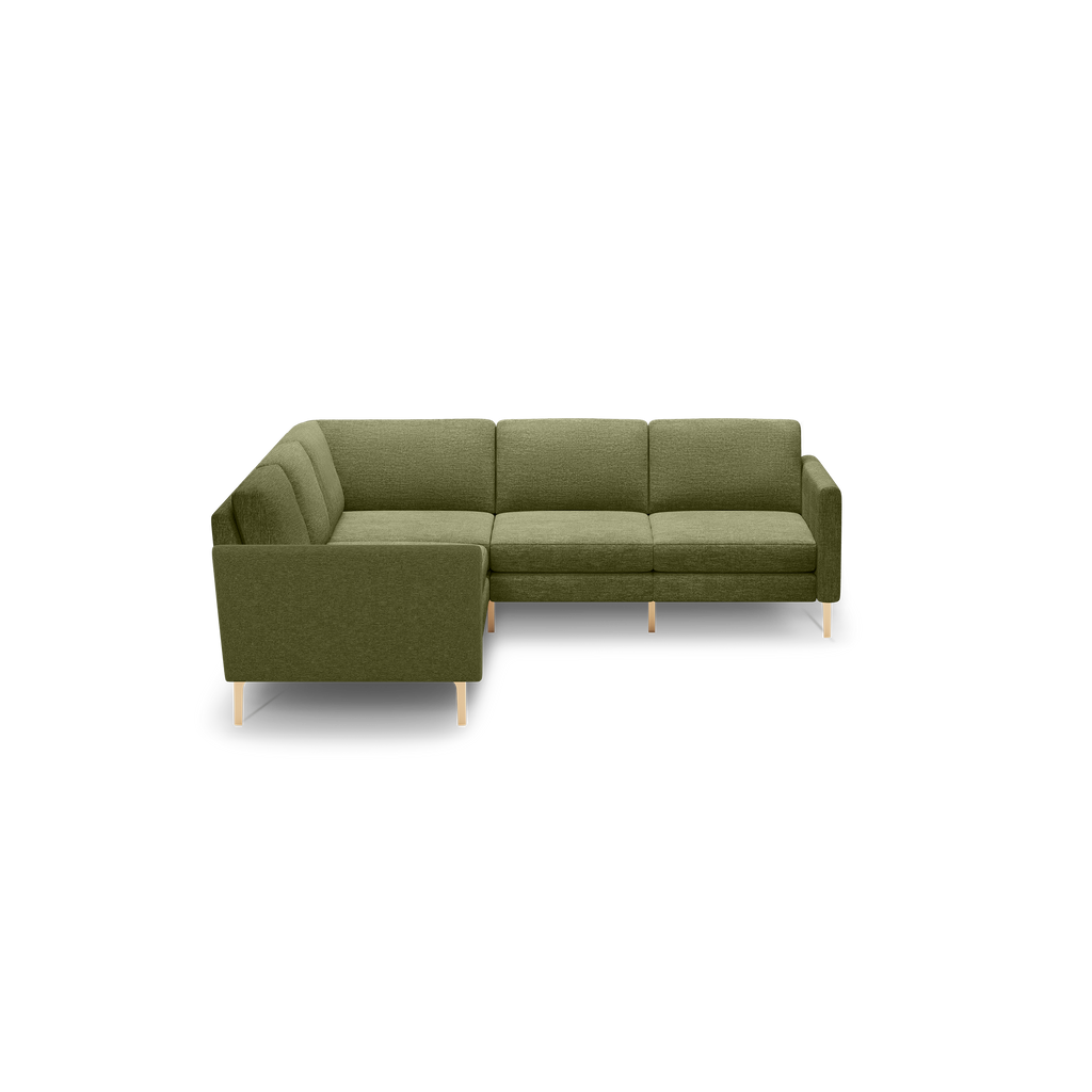 Modern L-shaped sectional sofa in olive green fabric with clean lines and light wooden legs, designed for spacious living areas.