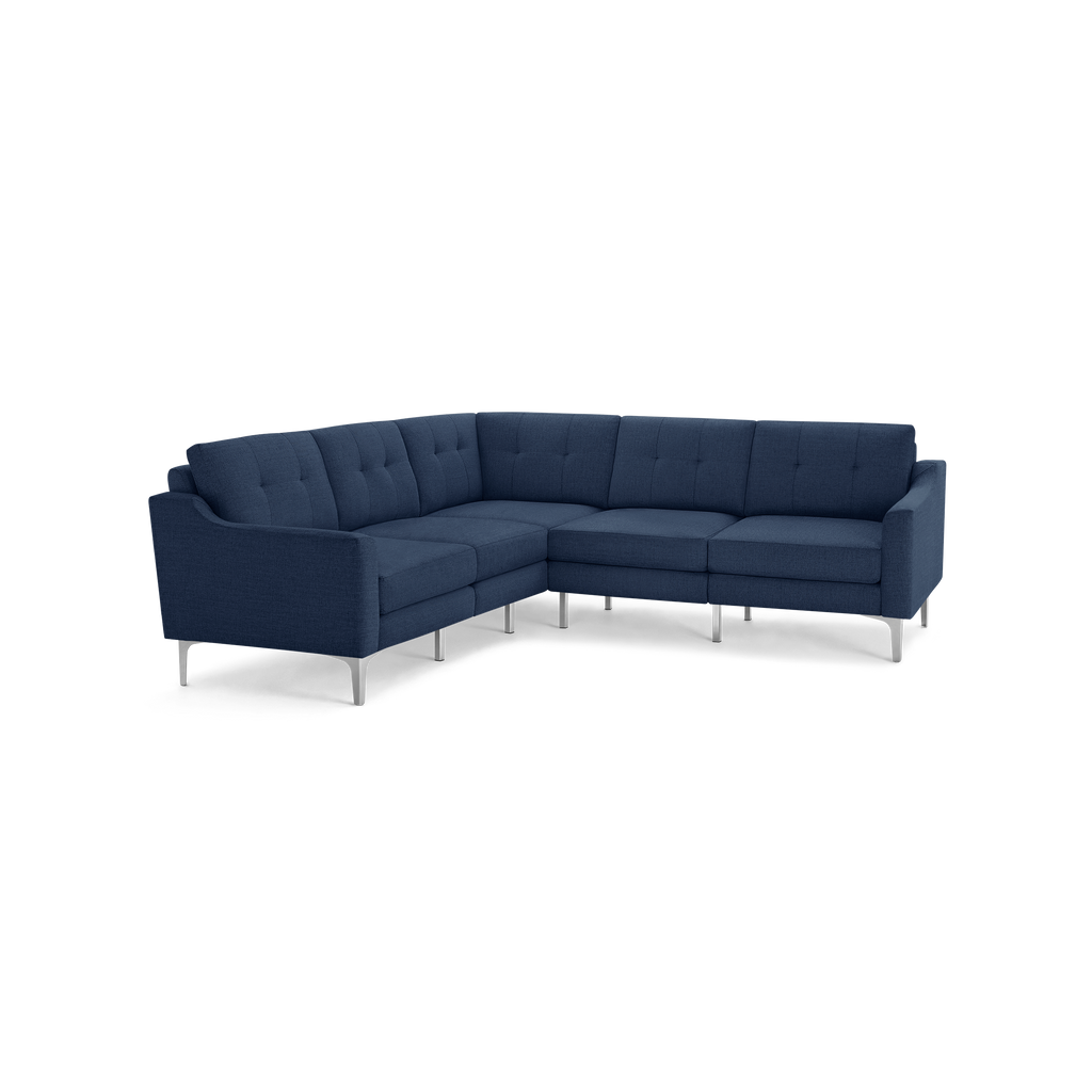 Modern navy blue fabric sectional sofa with tufted back cushions and sleek metal legs, designed for spacious corner seating.