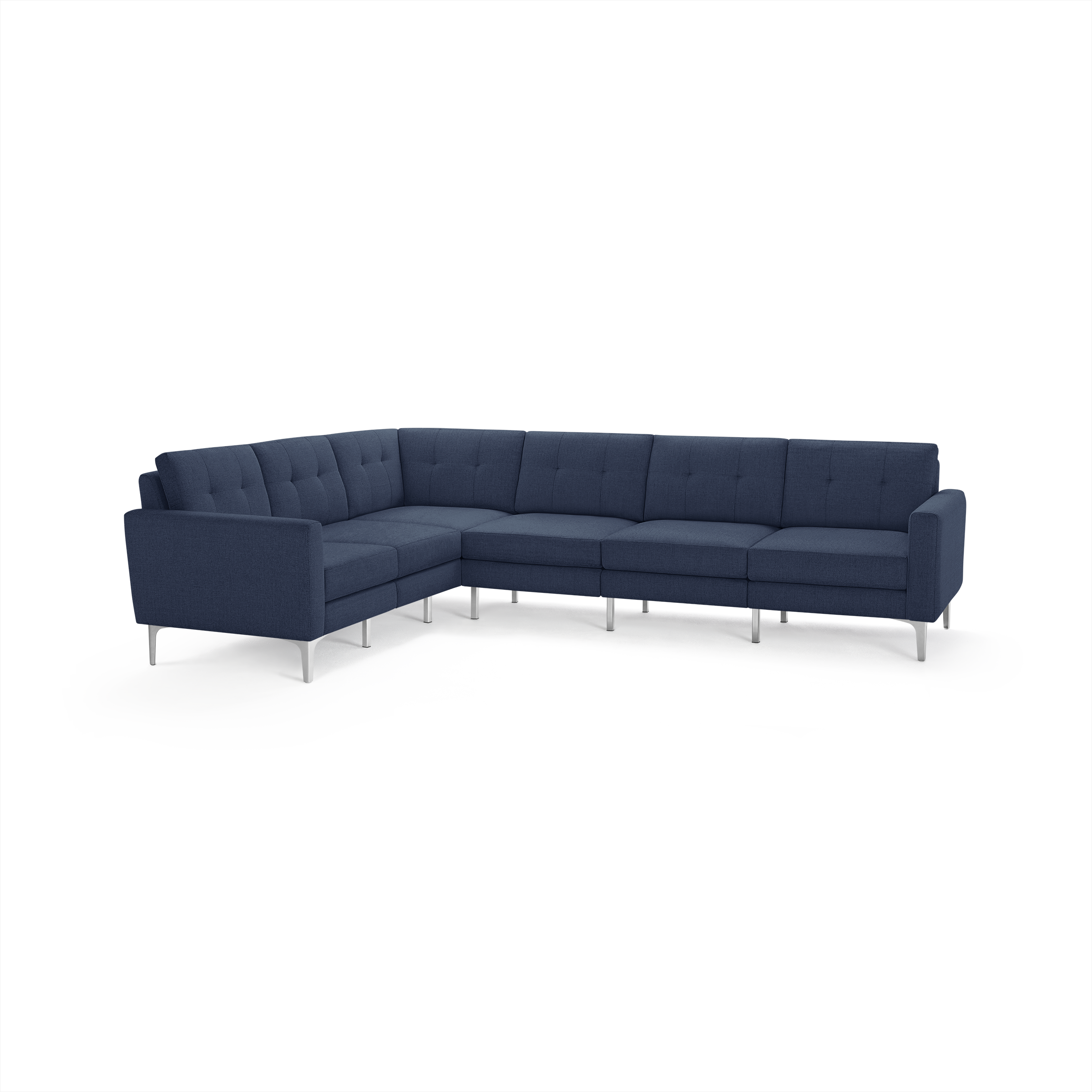 Modern L-shaped sectional sofa in dark blue fabric with tufted back cushions and sleek silver metal legs.