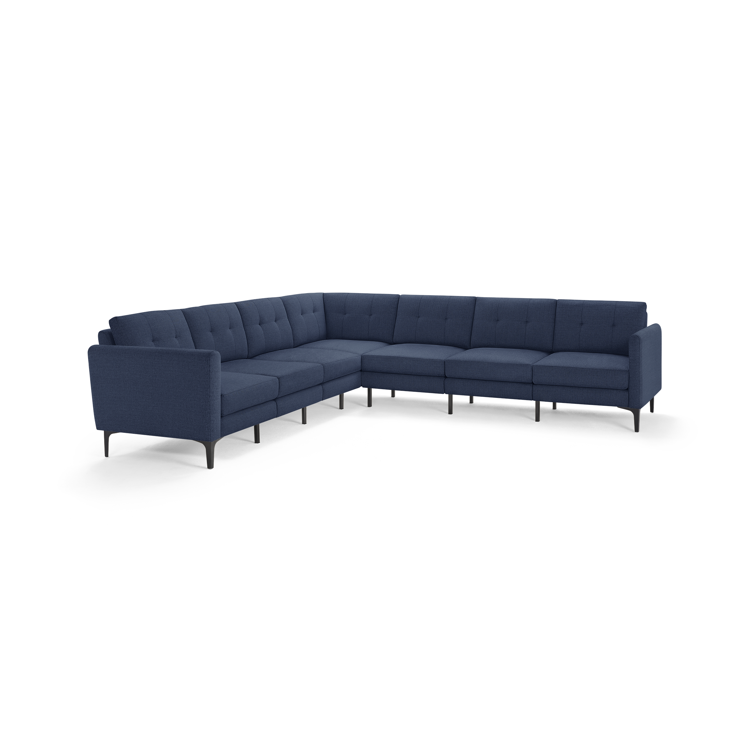 L-shaped sectional sofa with deep navy blue fabric upholstery, tufted back cushions, and slender black metal legs.