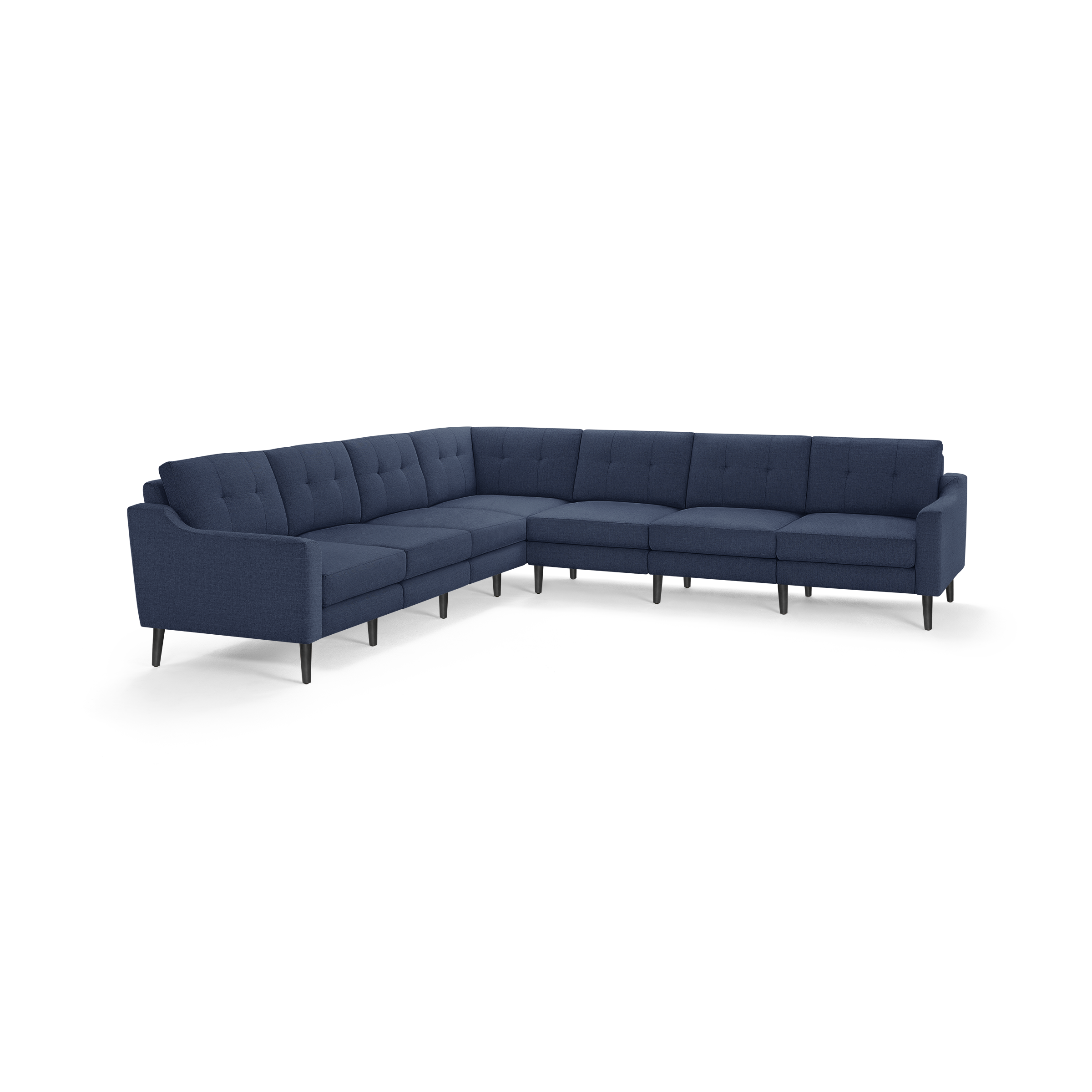 Large L-shaped navy blue sectional sofa with tufted back cushions and slim black legs, designed for modern living rooms.
