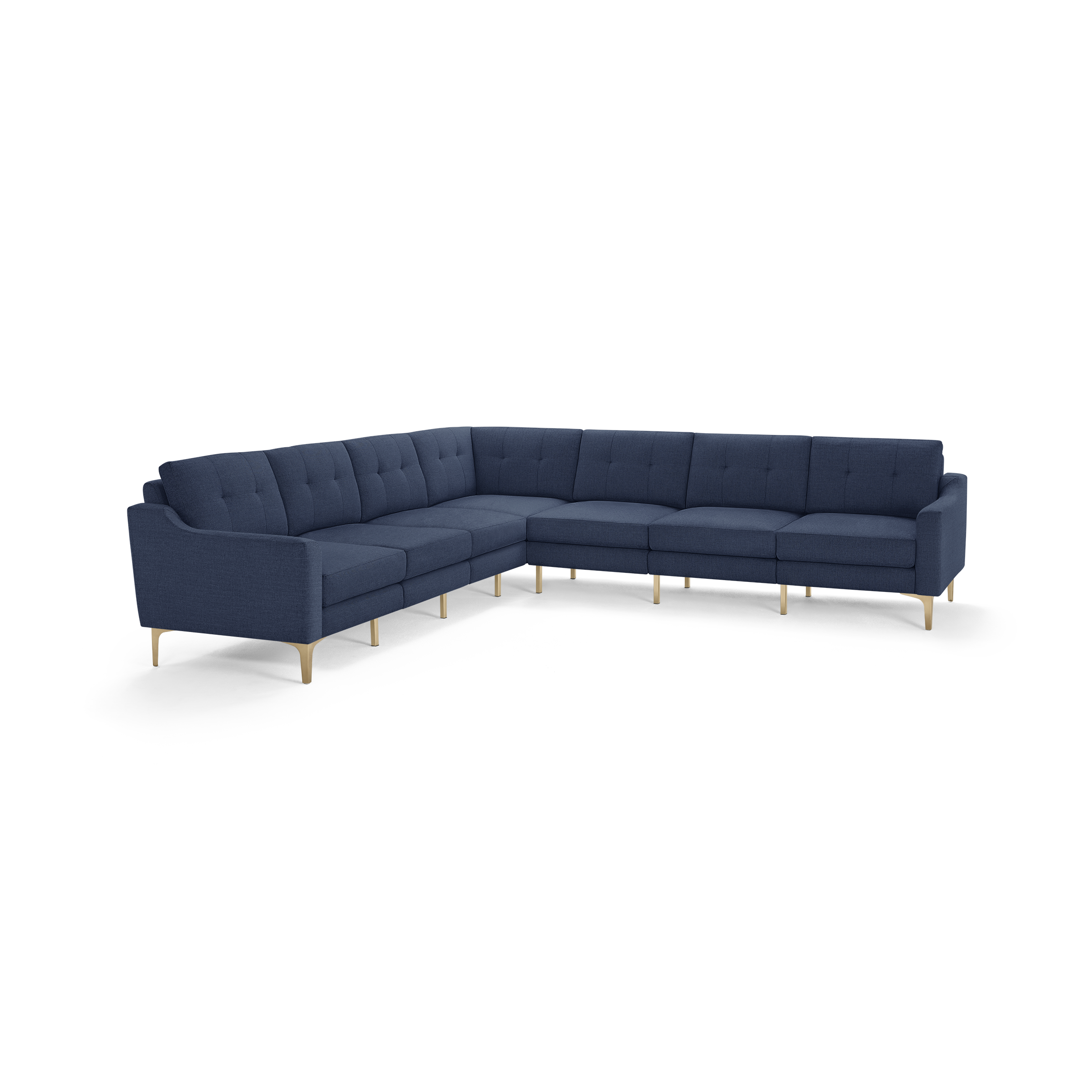 Large modern navy blue L-shaped sectional sofa with tufted back cushions and light wooden legs.