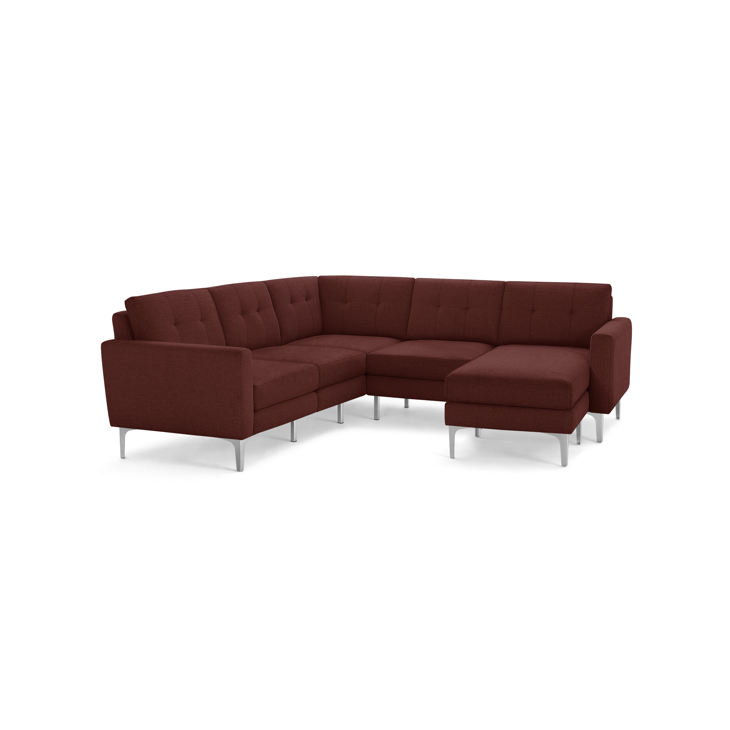 Modern L-shaped sectional sofa in deep red fabric with tufted cushions and sleek silver metal legs on isolated background.