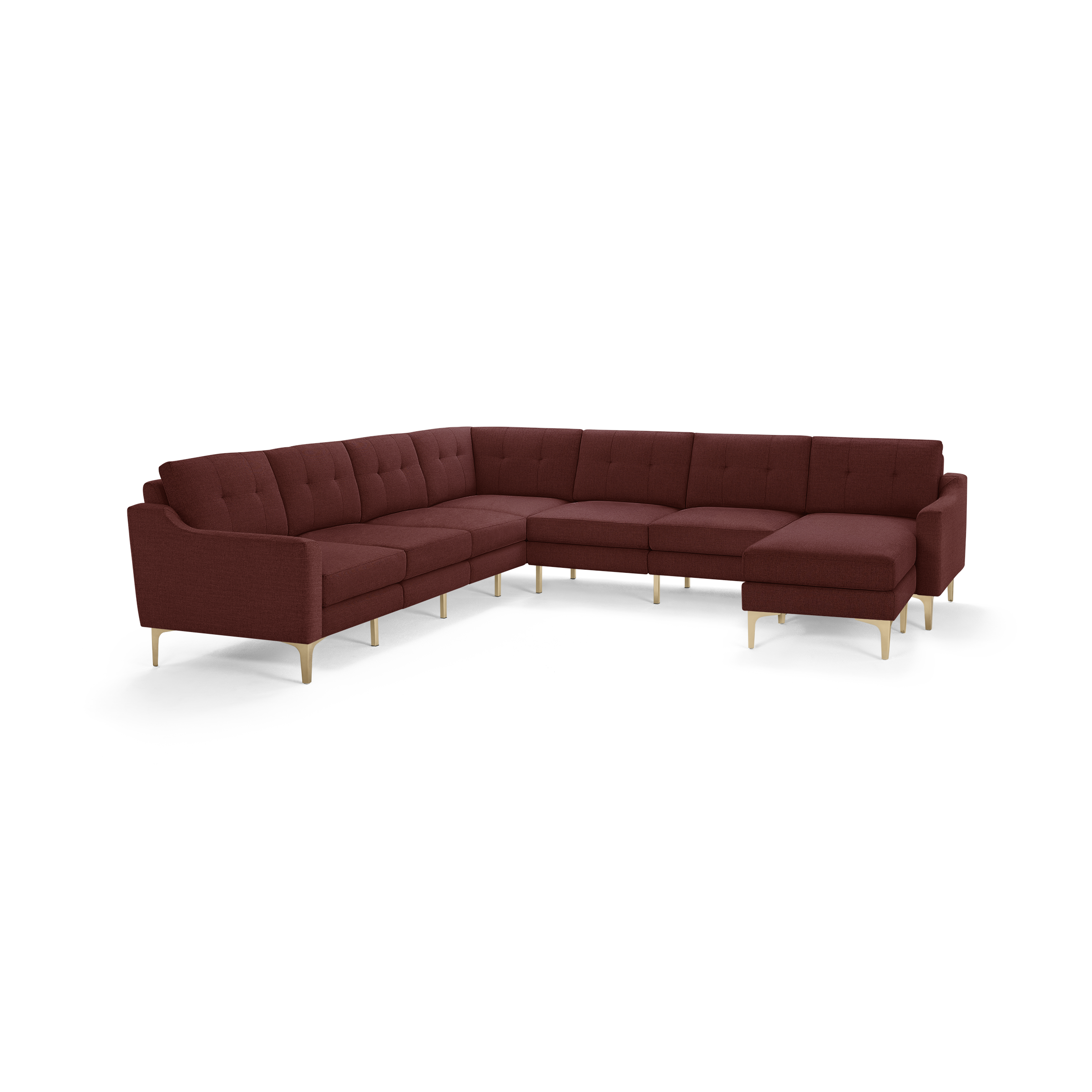 Modern L-shaped sectional sofa in deep red fabric with tufted back cushions and light wooden legs.