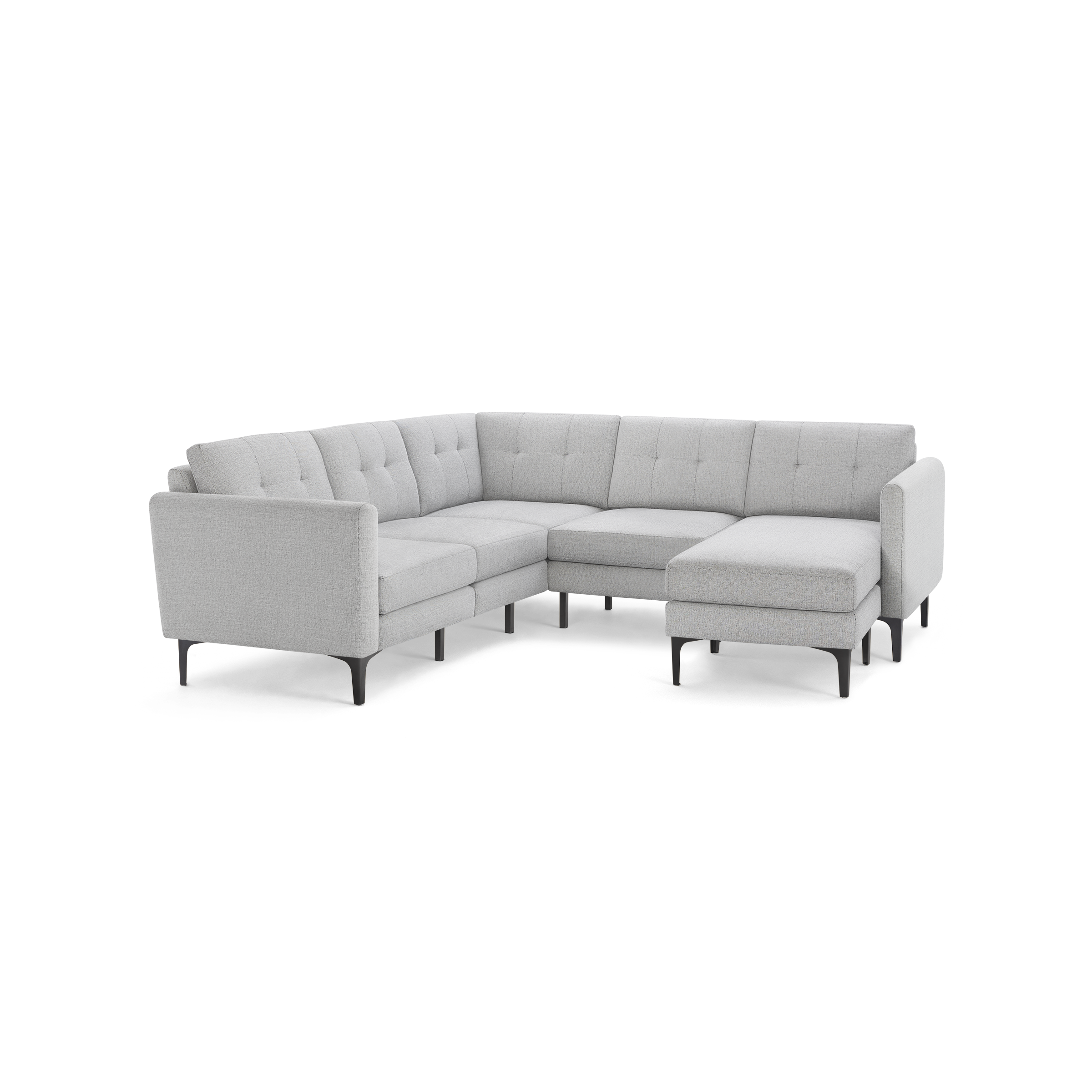Light gray L-shaped sectional sofa with tufted cushions, slim armrests, and black tapered legs, modern design.