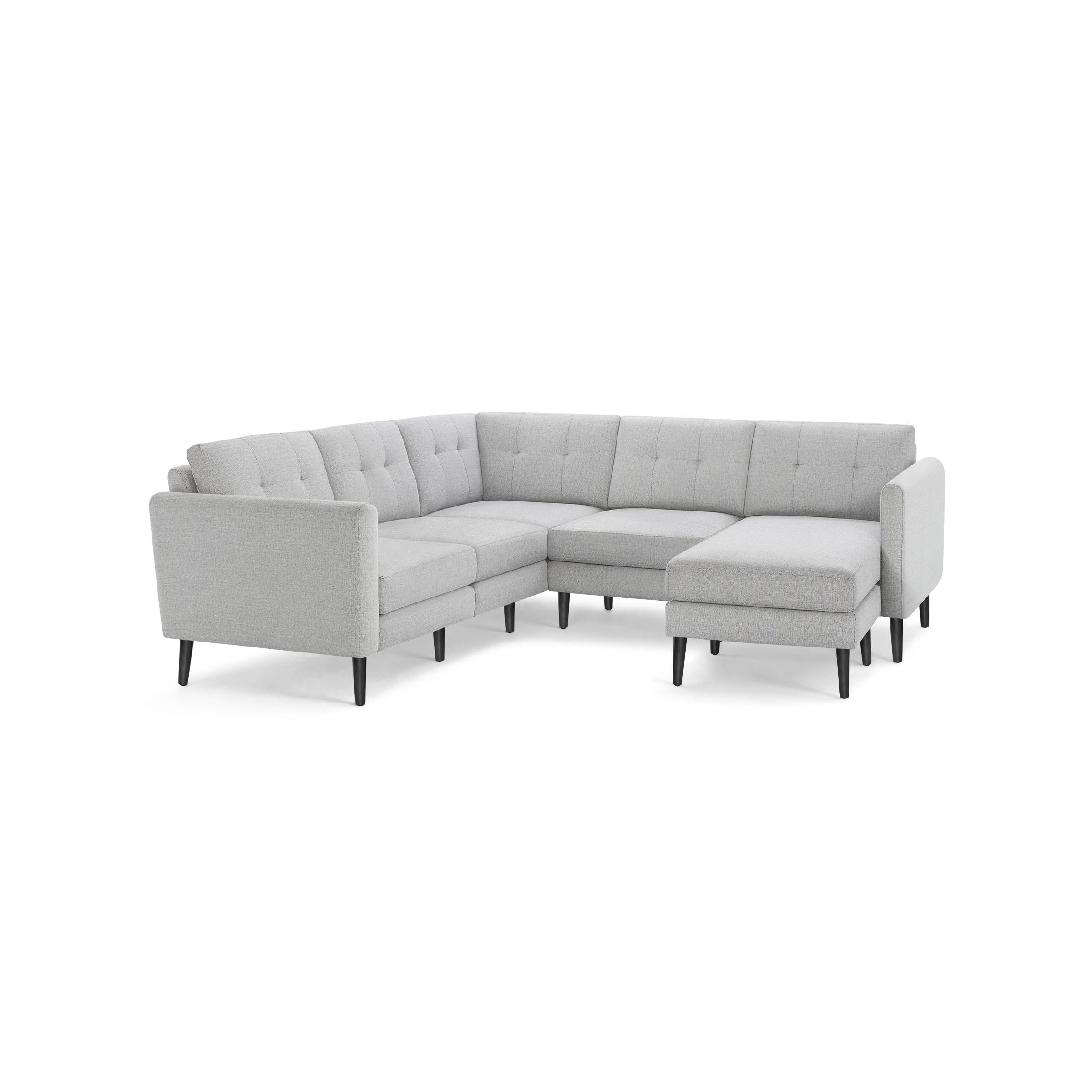 Light gray fabric L-shaped sectional sofa with button-tufted back cushions and dark wooden tapered legs, featuring a chaise lounge on the right side.