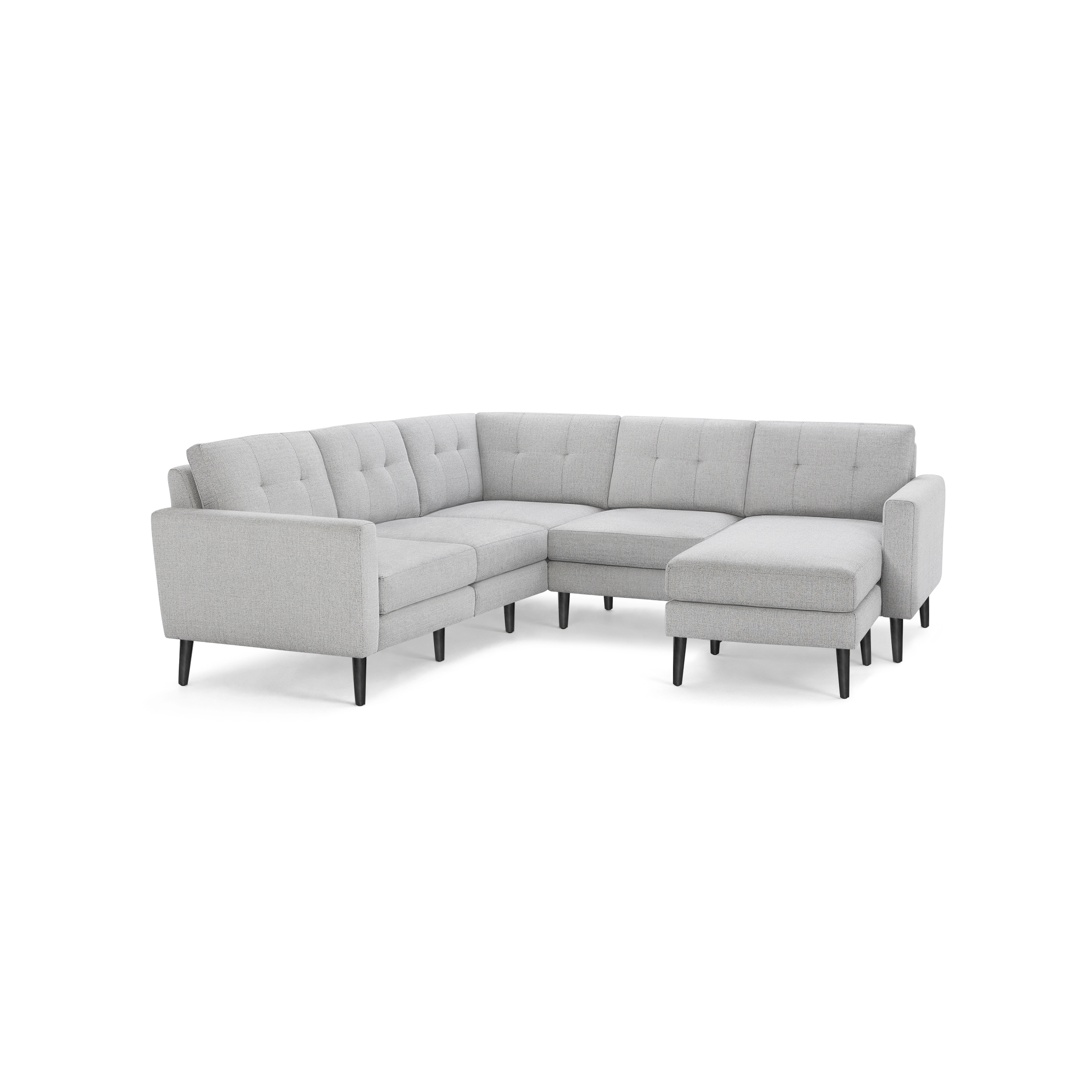Light gray fabric L-shaped sectional sofa with tufted back cushions and black tapered wooden legs.