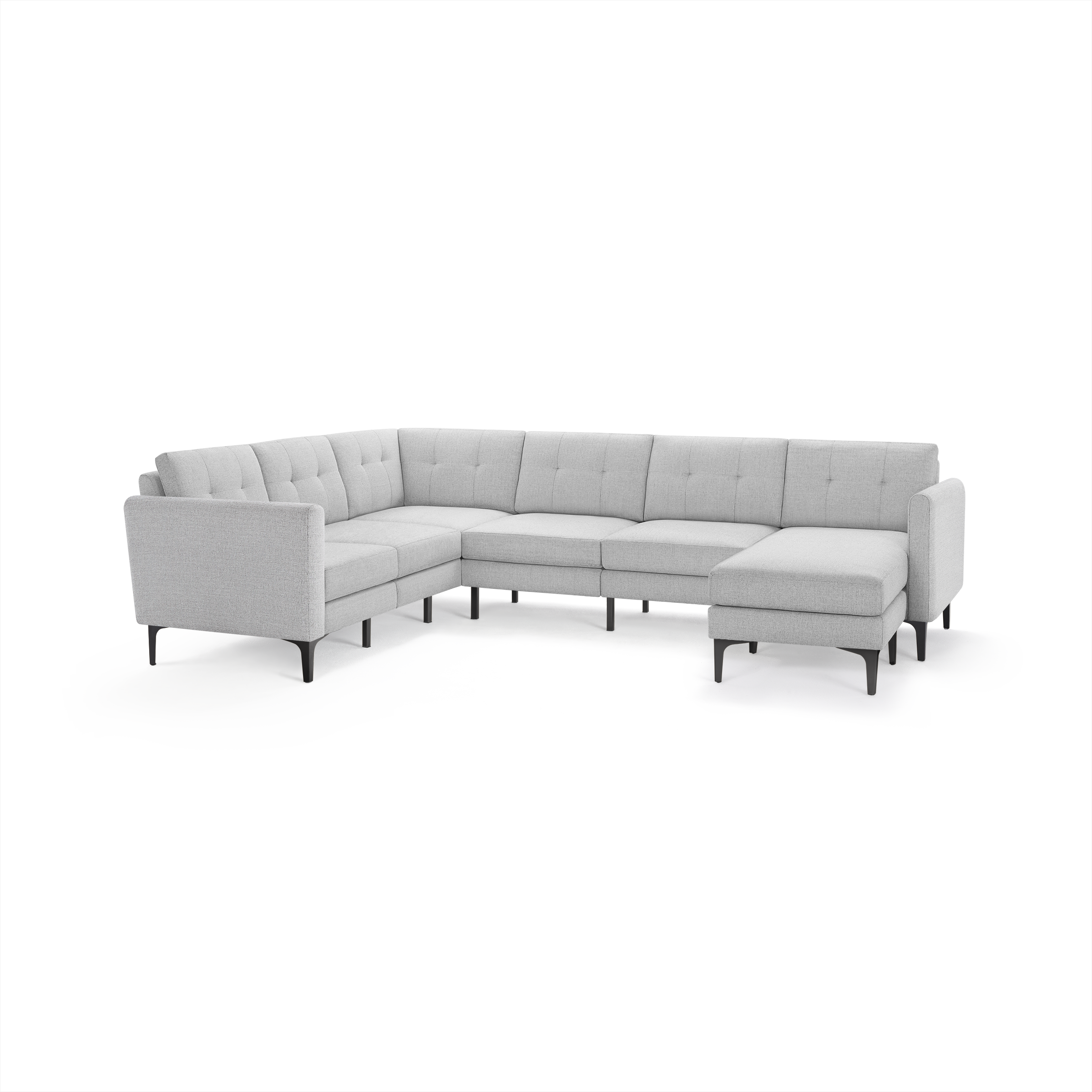 Light gray L-shaped sectional sofa with tufted cushions, slim black legs, and modern minimalist design.