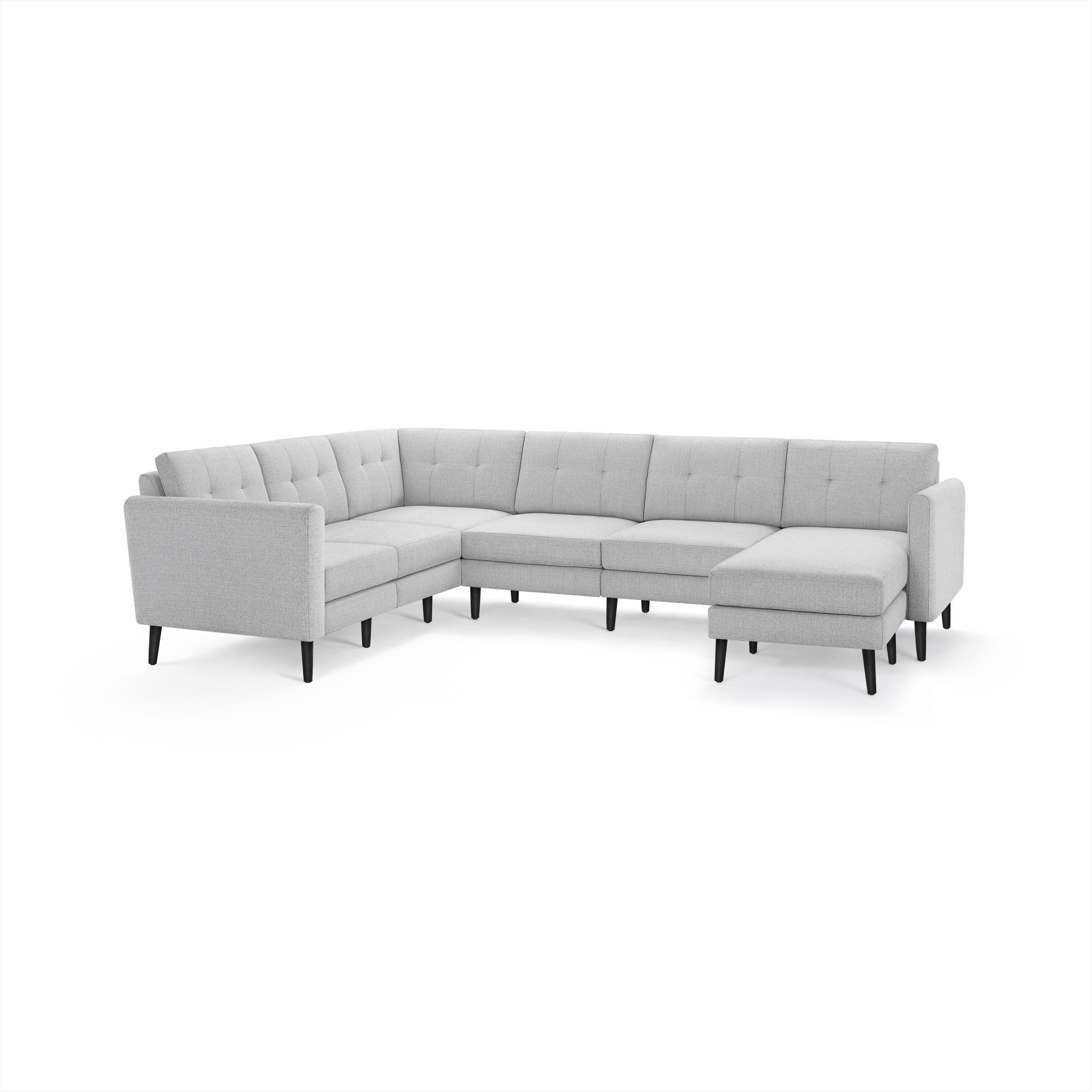 Light grey fabric L-shaped sectional sofa with tufted backrest cushions and black tapered wooden legs.