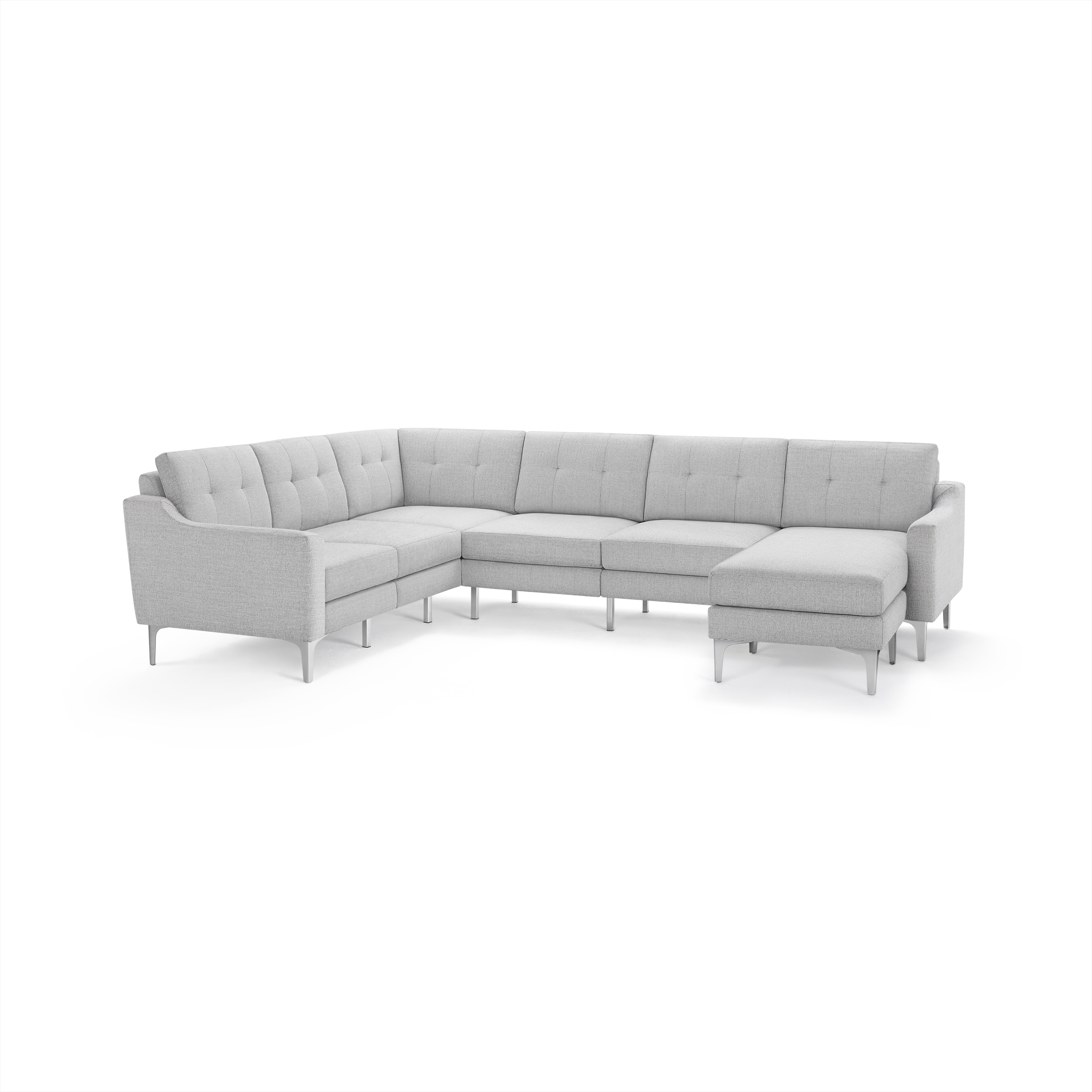 Light gray L-shaped sectional sofa with modern metal legs, tufted back cushions, and right chaise lounge.