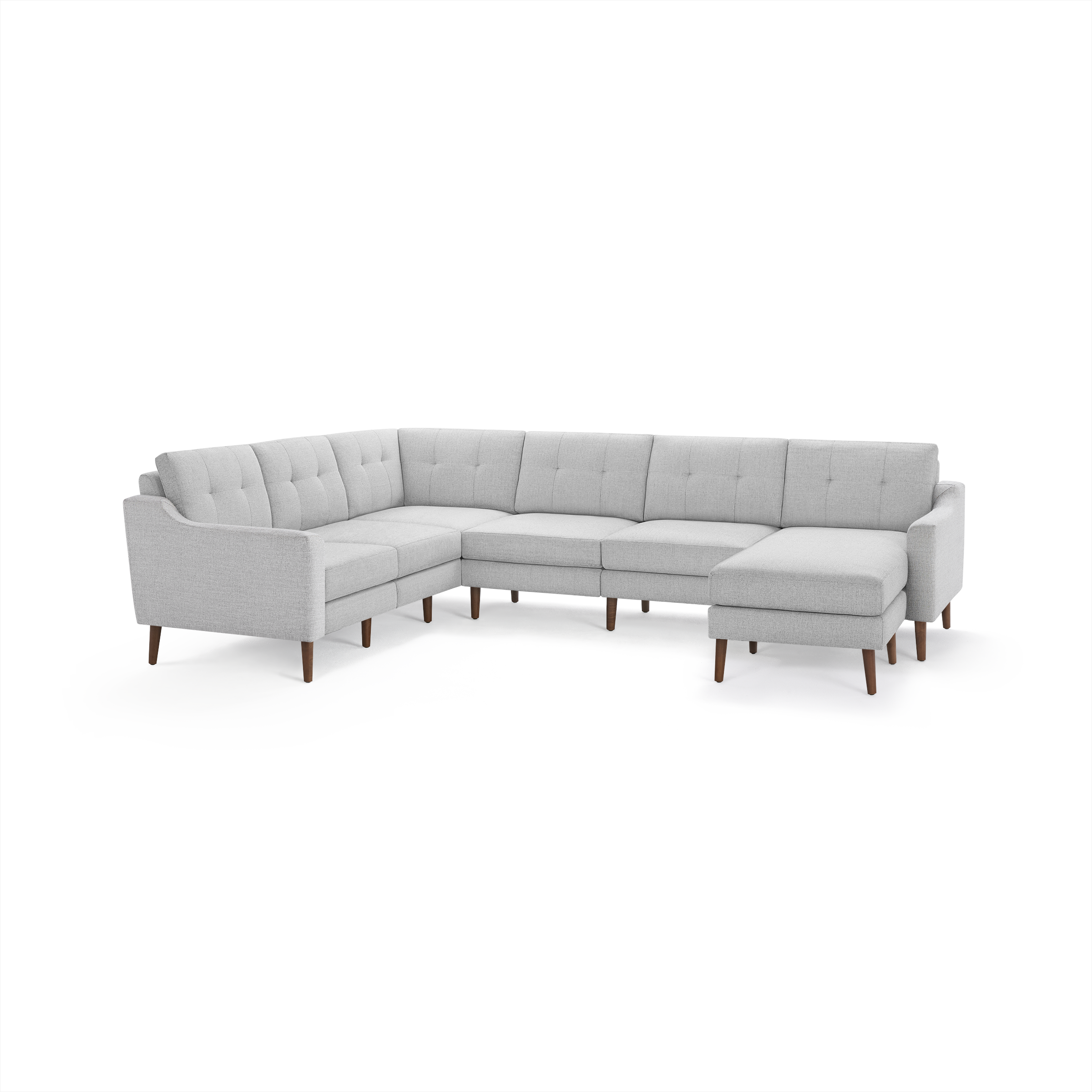 Light gray modern L-shaped sectional sofa with button-tufted back cushions and wooden legs.