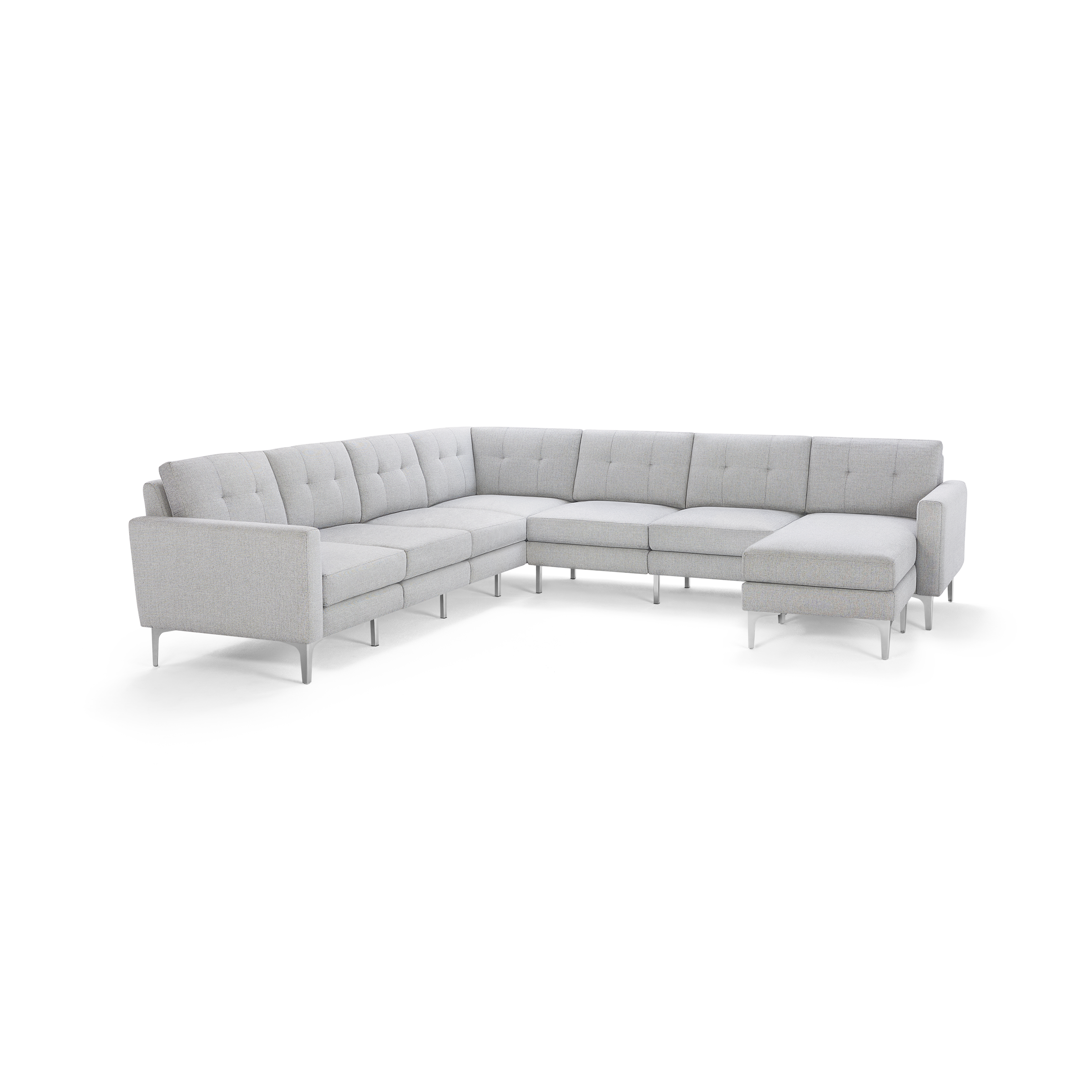Light gray L-shaped sectional sofa with tufted cushioning, slim armrests, and metal legs, designed for modern living rooms.