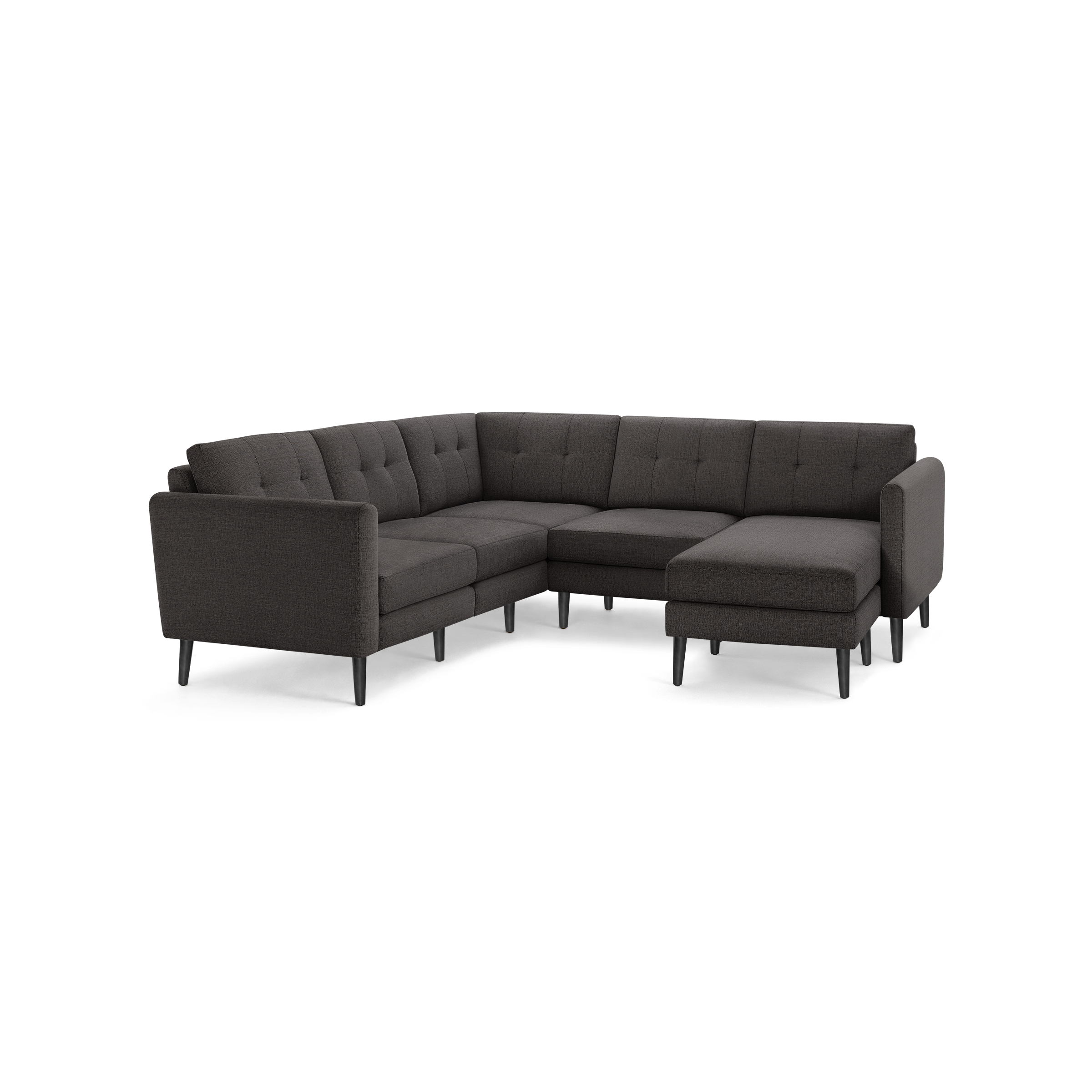 Dark gray fabric L-shaped sectional sofa with tufted cushions and slim black legs, modern and minimalist design.