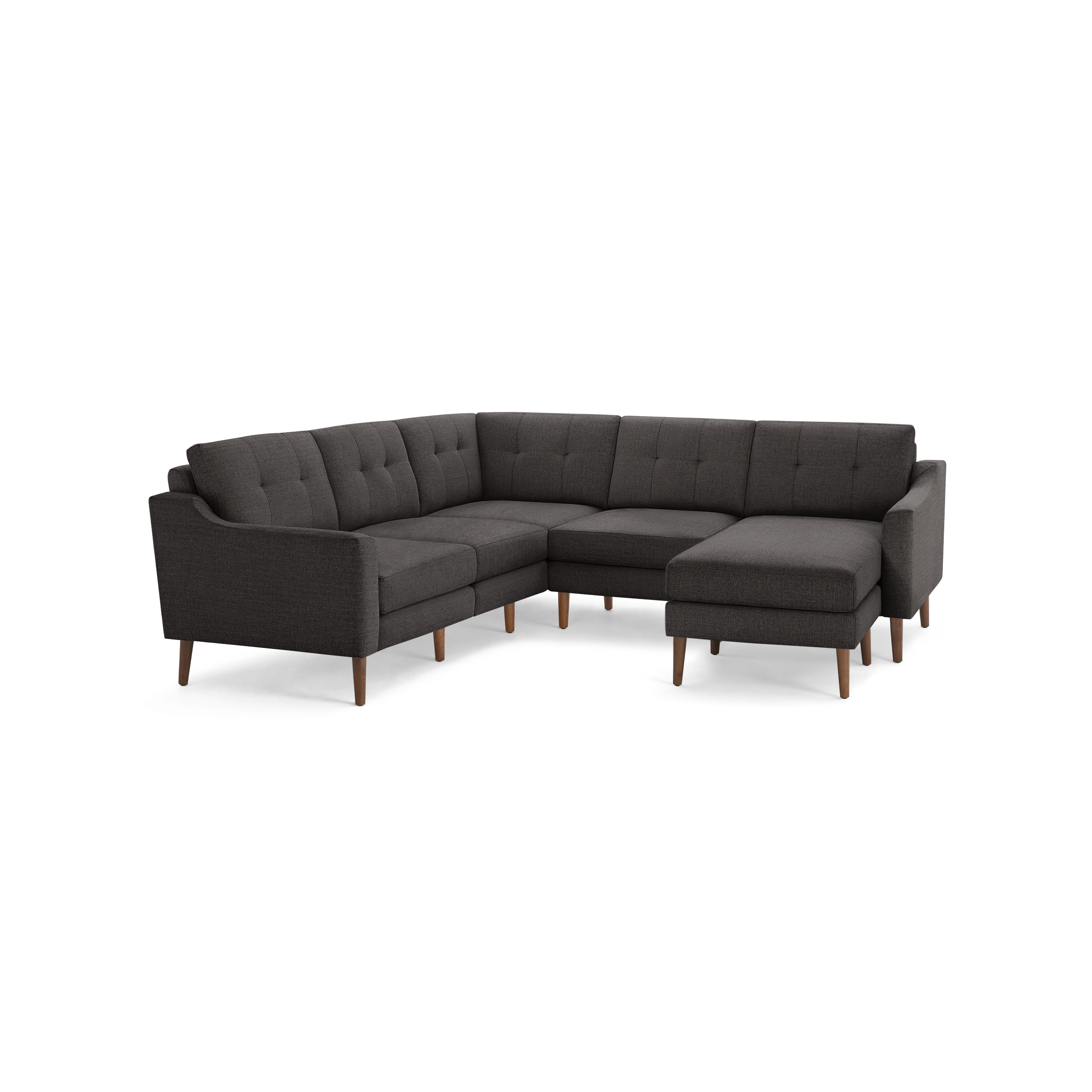 Dark gray fabric sectional sofa with tufted cushions, wooden legs, and a right-side chaise lounge.