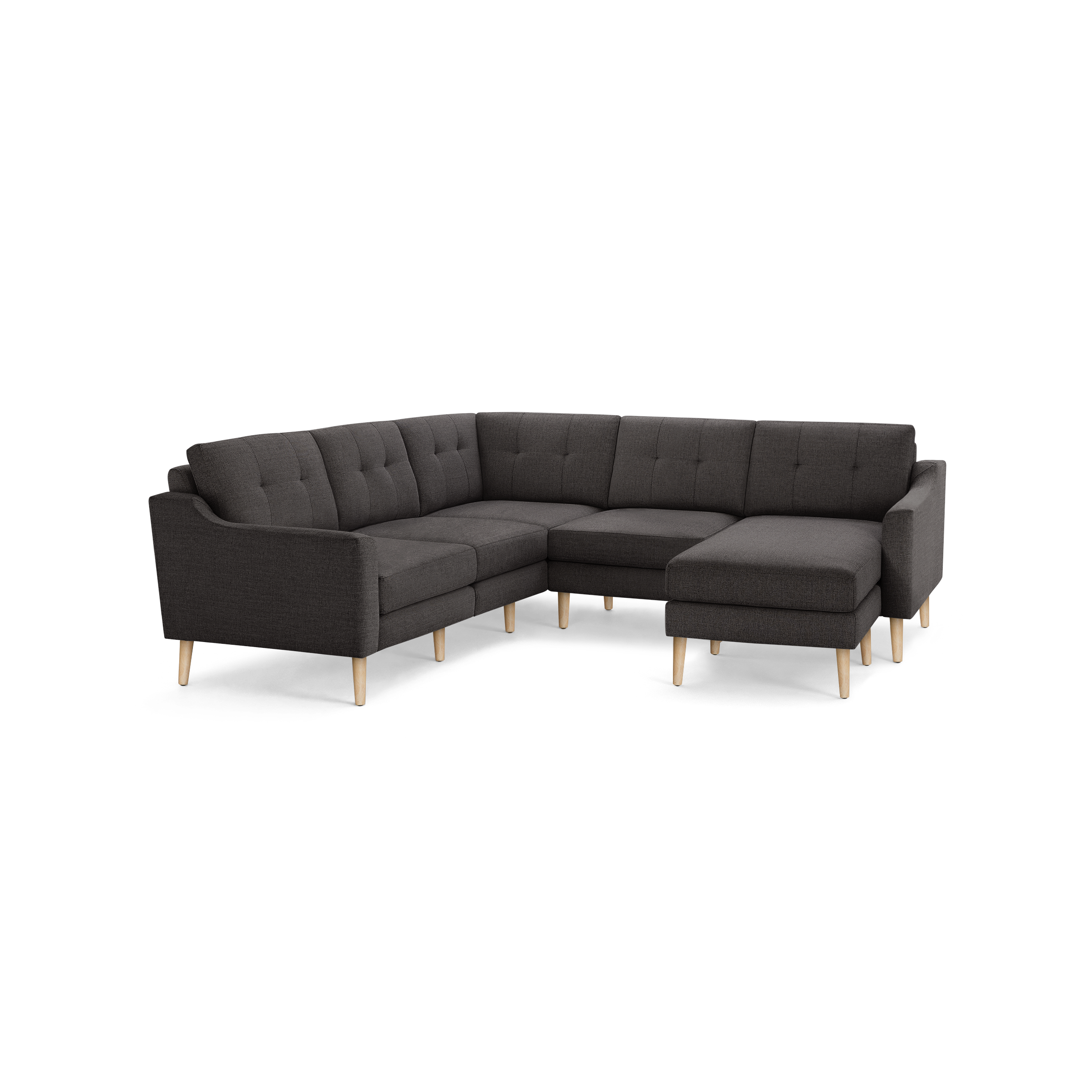 Dark gray fabric L-shaped sectional sofa with tufted back cushions and light wooden legs, designed for modern living rooms.