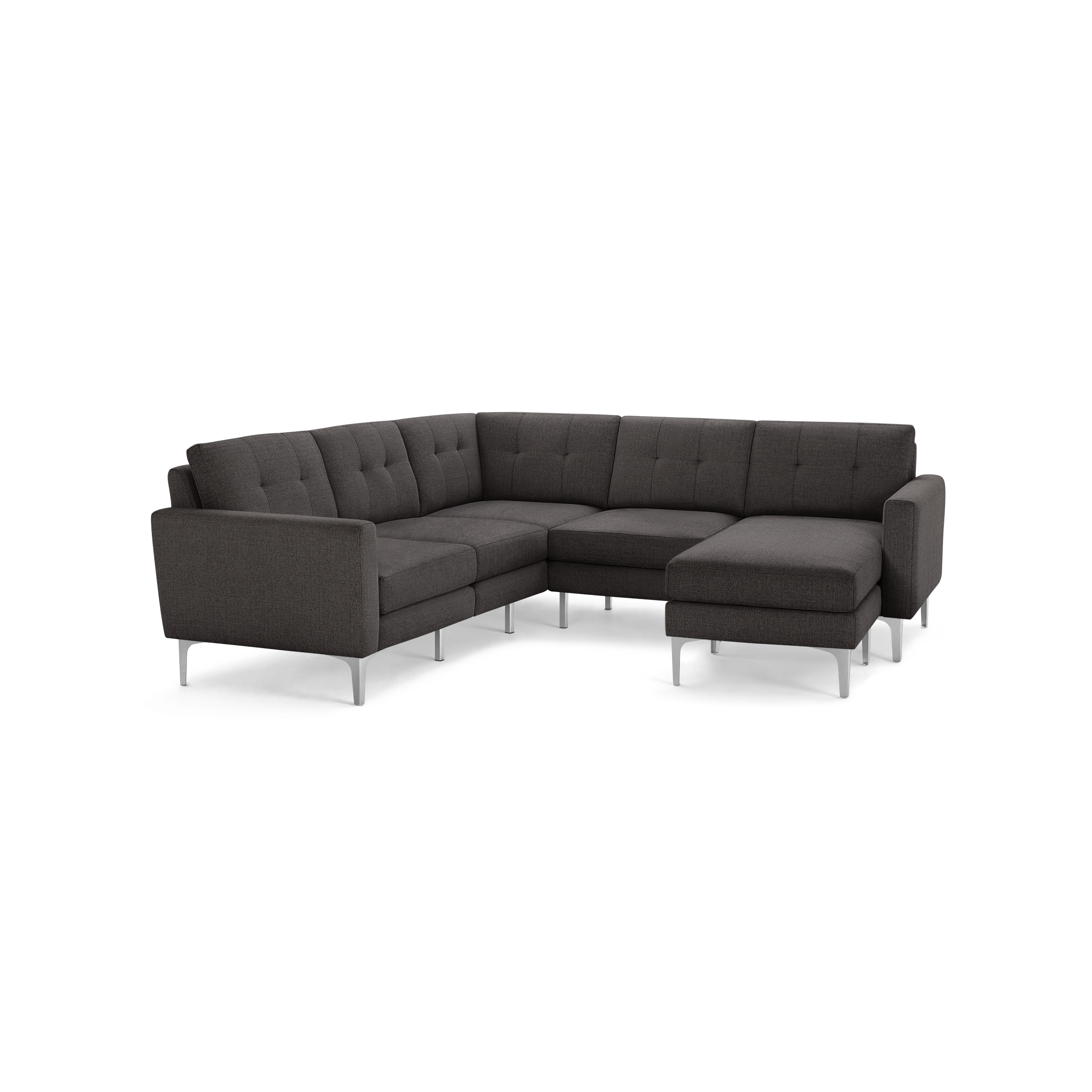 Dark gray fabric L-shaped sectional sofa with tufted back cushions and sleek silver metal legs.