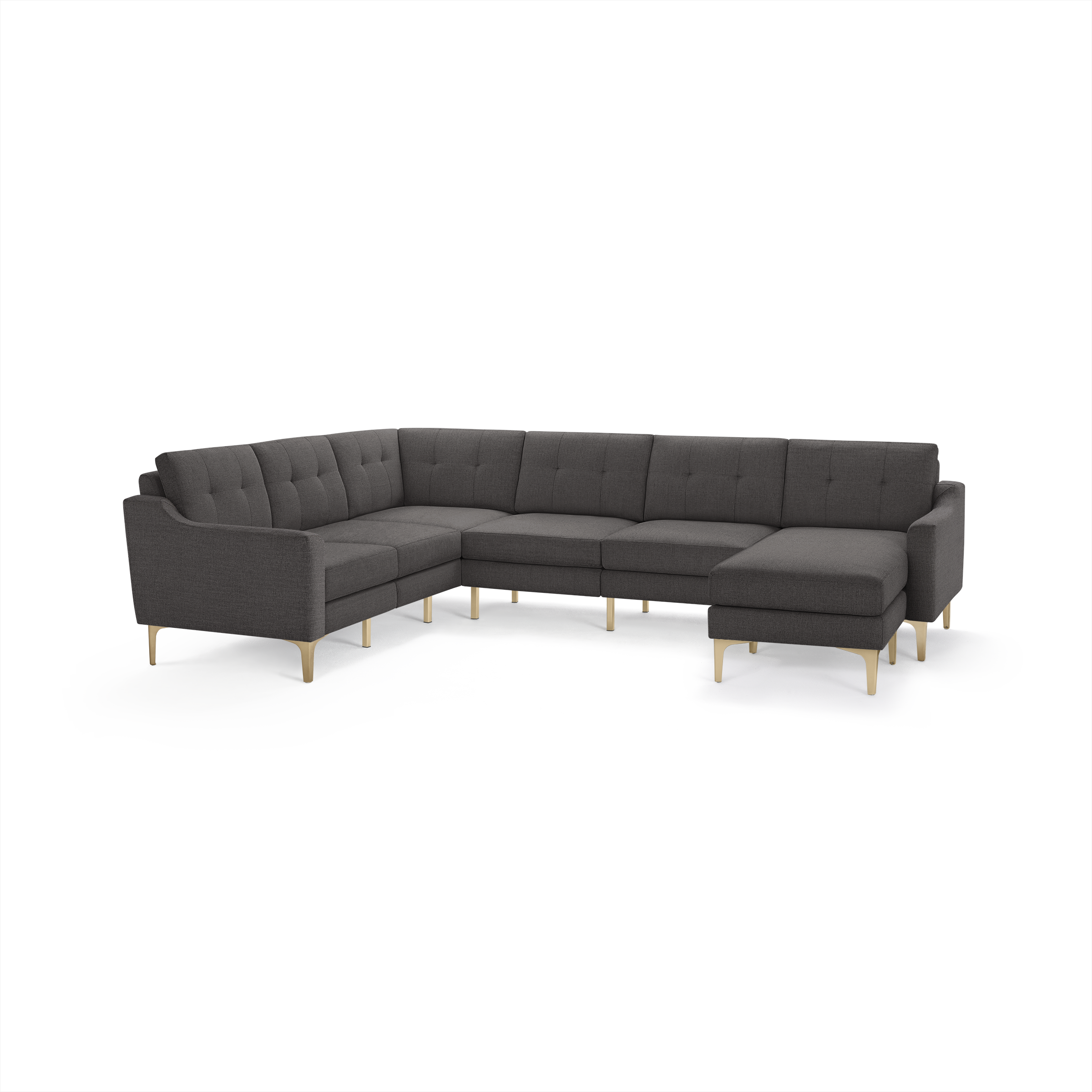 Dark gray upholstered modern sectional sofa with tufted backrests and light wood legs, L-shaped design with chaise lounge.