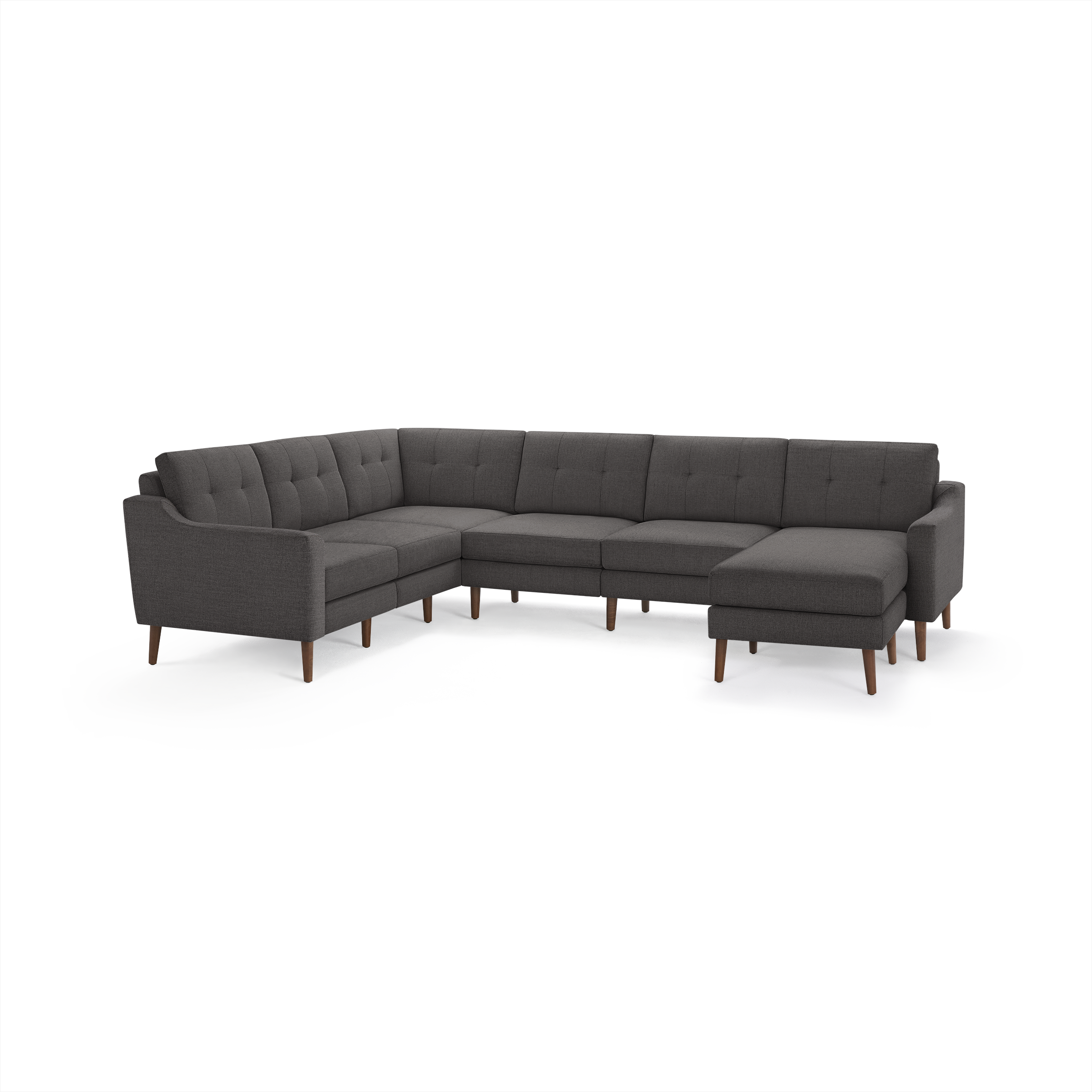 Modern dark gray fabric sectional sofa with tufted back cushions, wooden legs, and right-side chaise lounge.