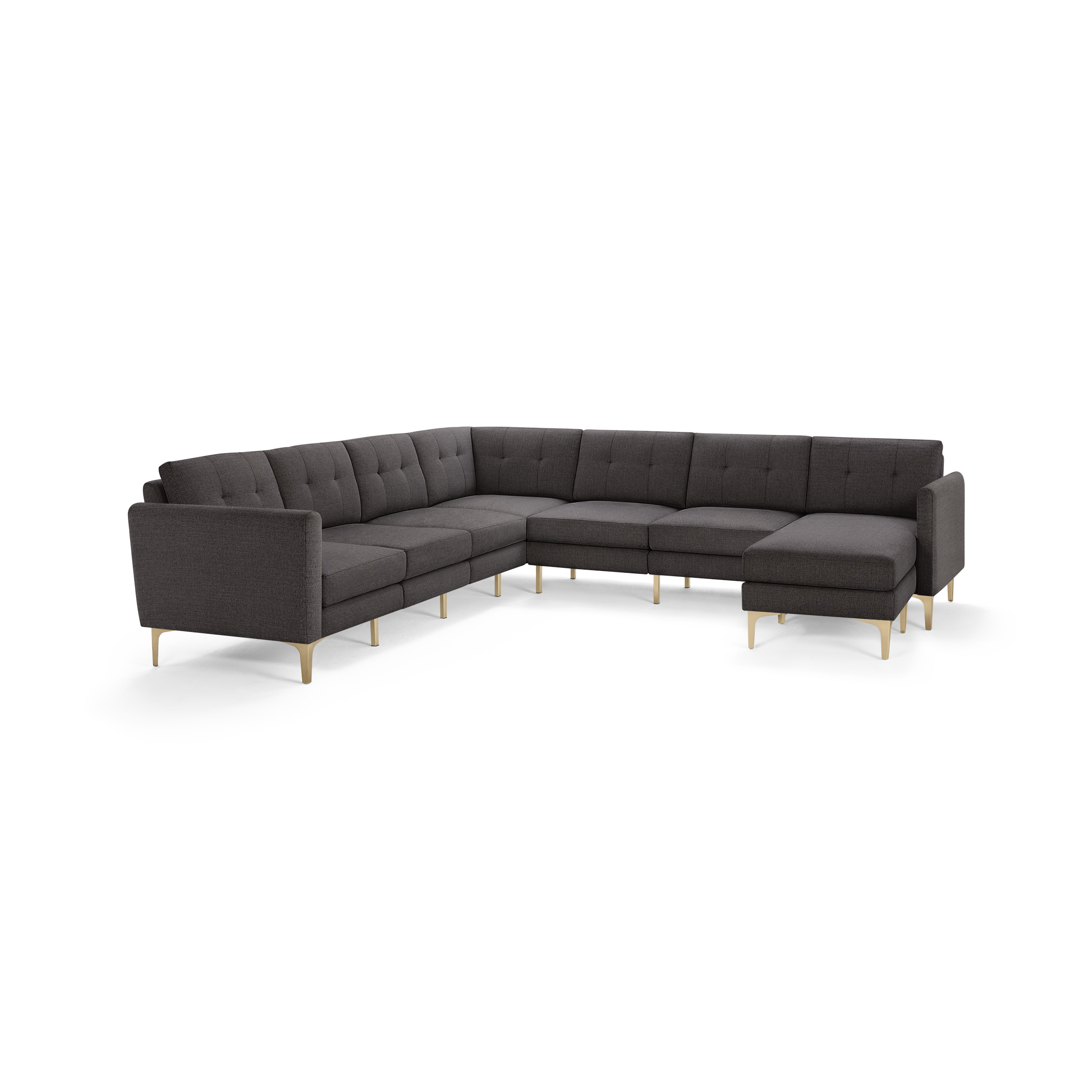 Large dark gray L-shaped sectional sofa with tufted back cushions and light wooden legs, modern design.