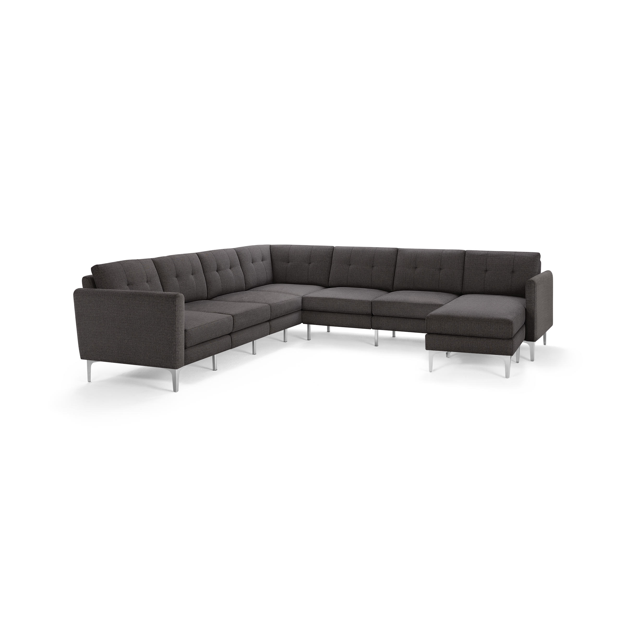Dark gray modern L-shaped sectional sofa with tufted cushions and slim metal legs on a white background.