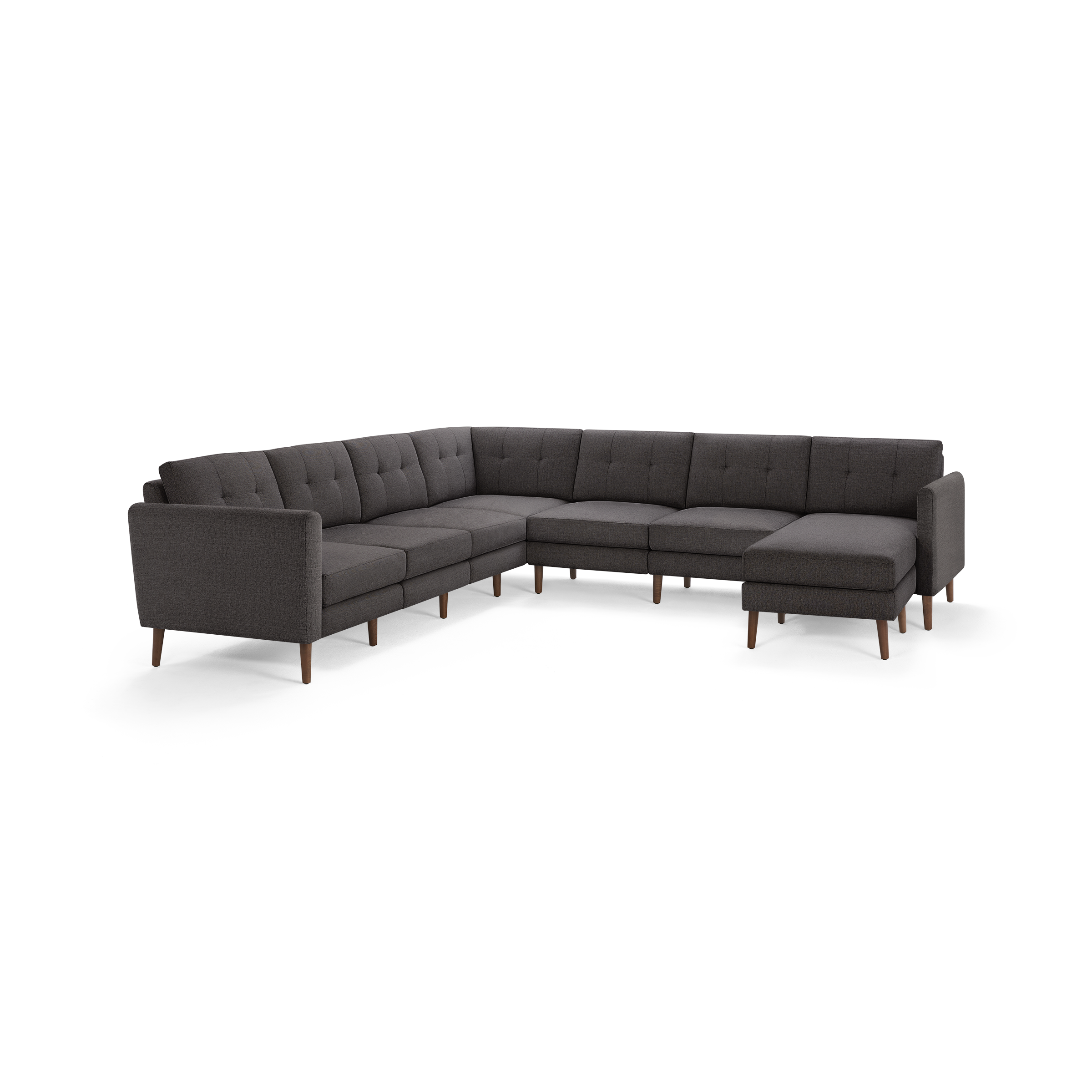 Dark gray fabric sectional sofa with tufted cushions, wooden legs, and an L-shaped design.