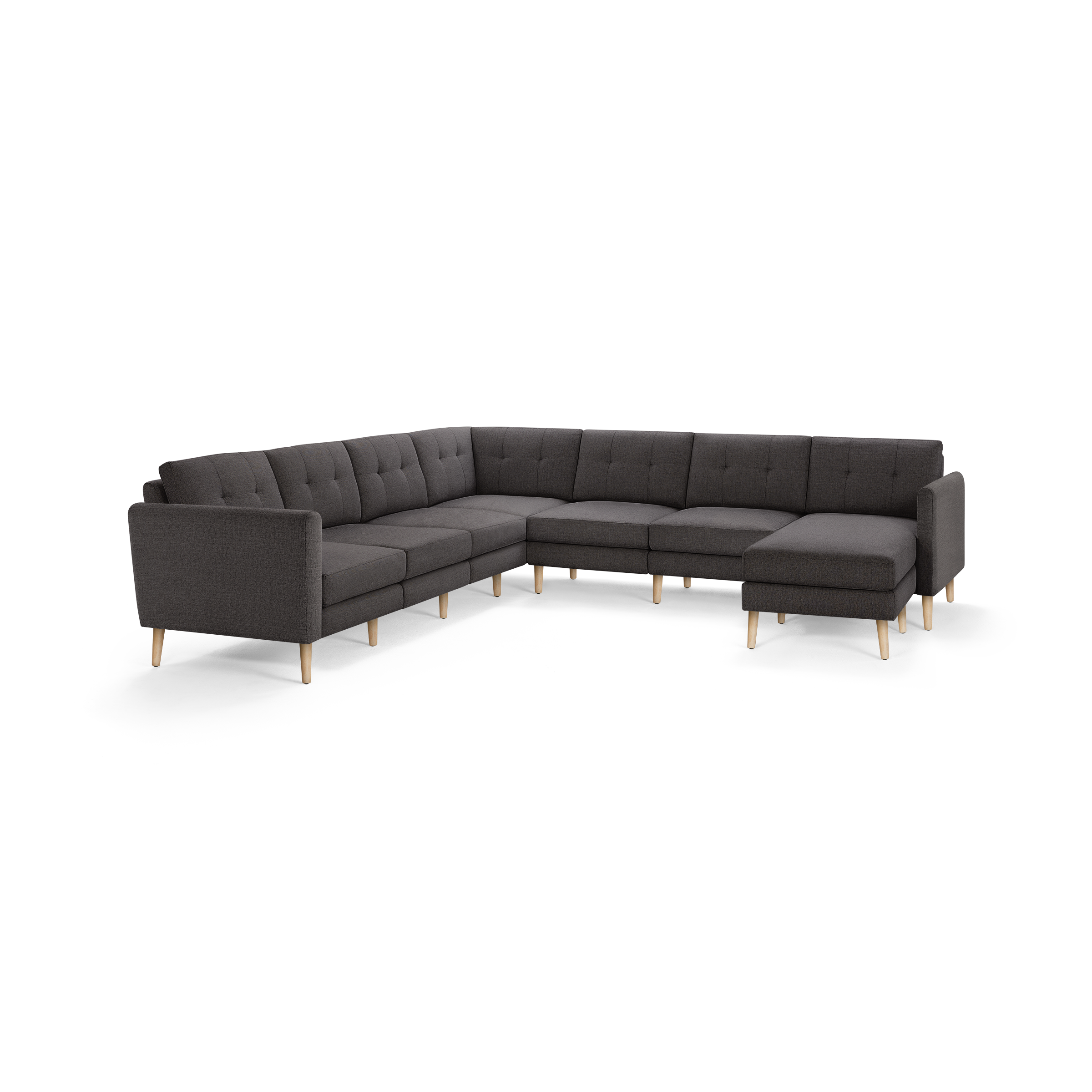 Dark gray L-shaped sectional sofa with tufted back cushions and light wooden legs, modern and minimalist design.