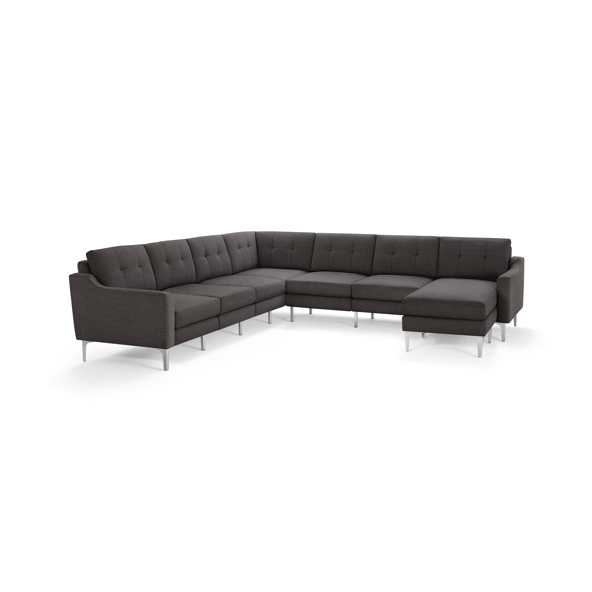 Dark gray modern L-shaped sectional sofa with tufted back cushions and slim metal legs, designed for spacious living rooms.