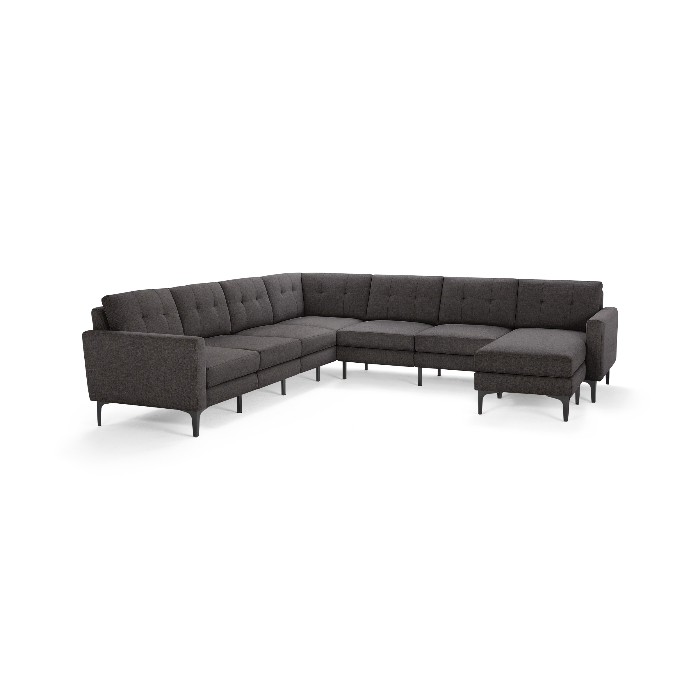 Large modern dark gray fabric sectional sofa with tufted back cushions and sleek metal legs, arranged in an L-shape.