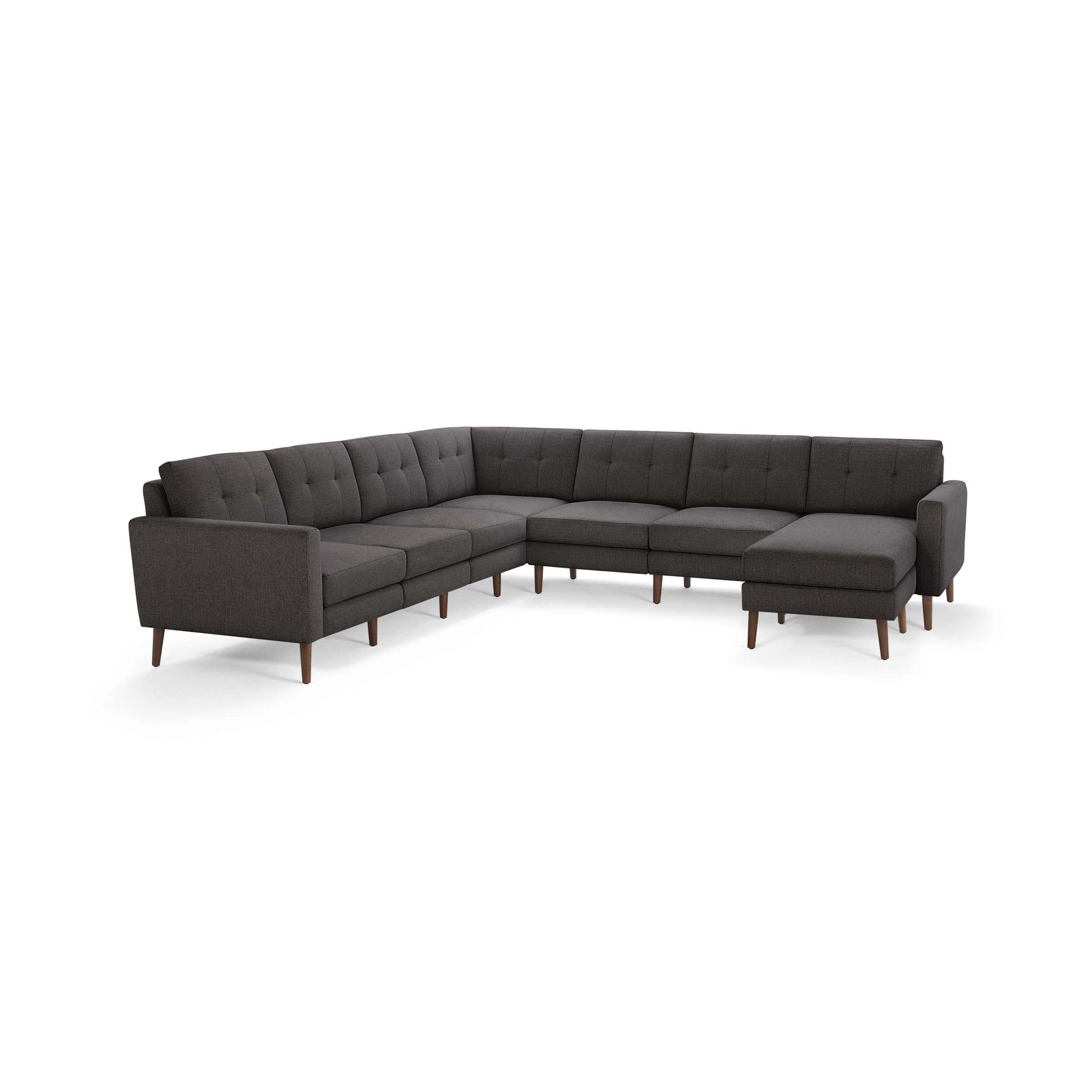 Dark gray L-shaped sectional sofa with tufted back cushions and wooden legs, featuring a chaise lounge on the right side.
