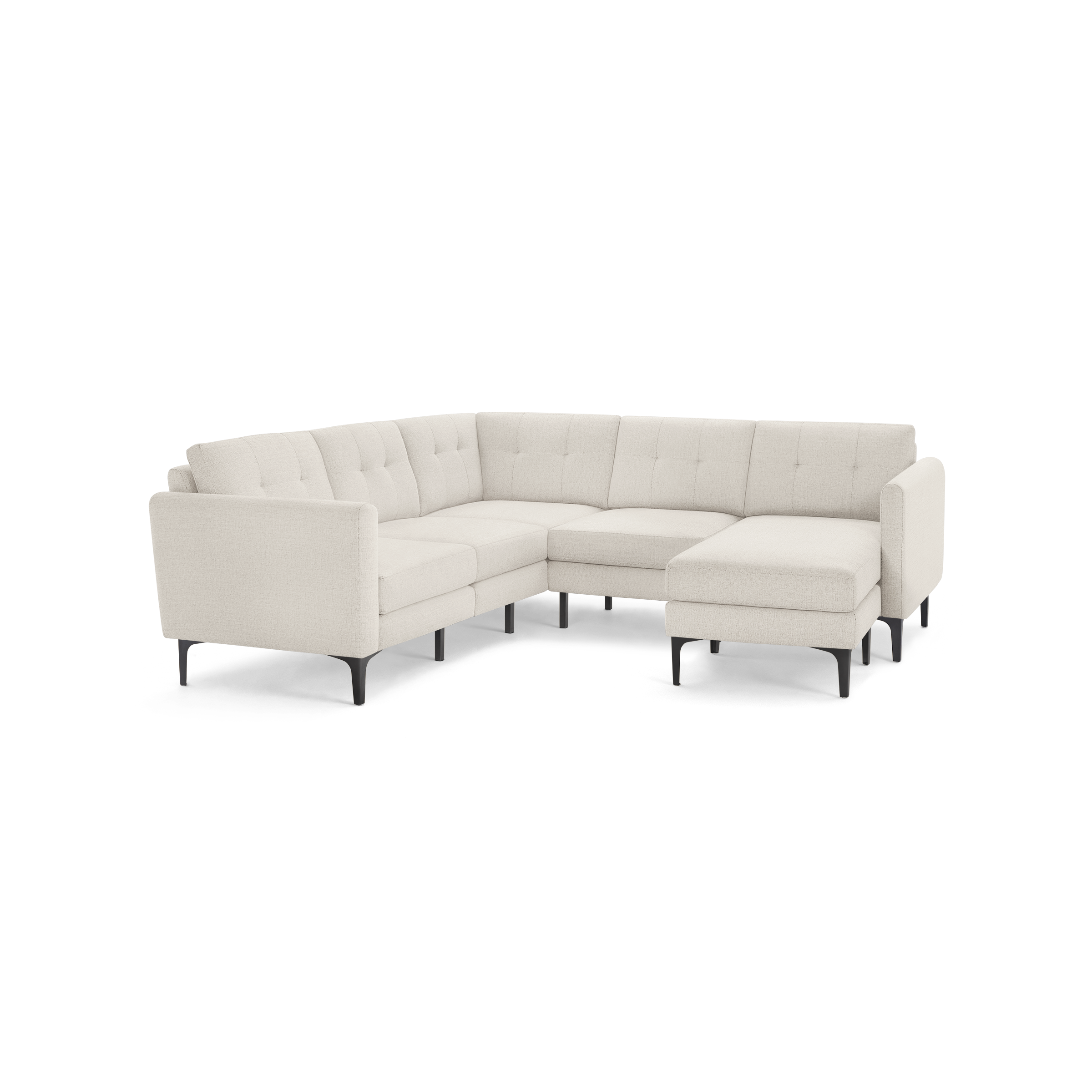 Light beige L-shaped sectional sofa with tufted back cushions and slim black metal legs on a white background.