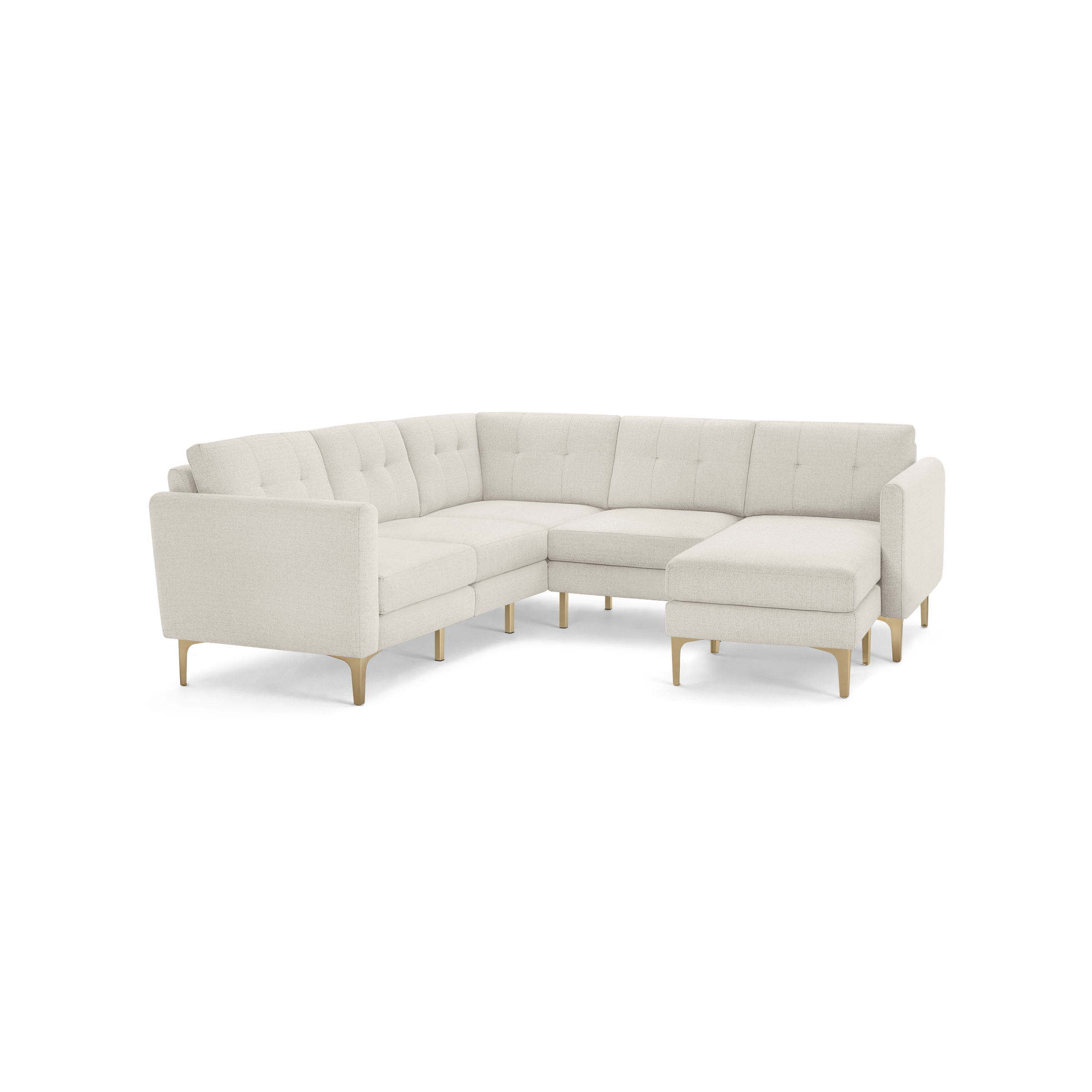 Cream-colored modern L-shaped sectional sofa with tufted cushions and light wooden legs on a black background.