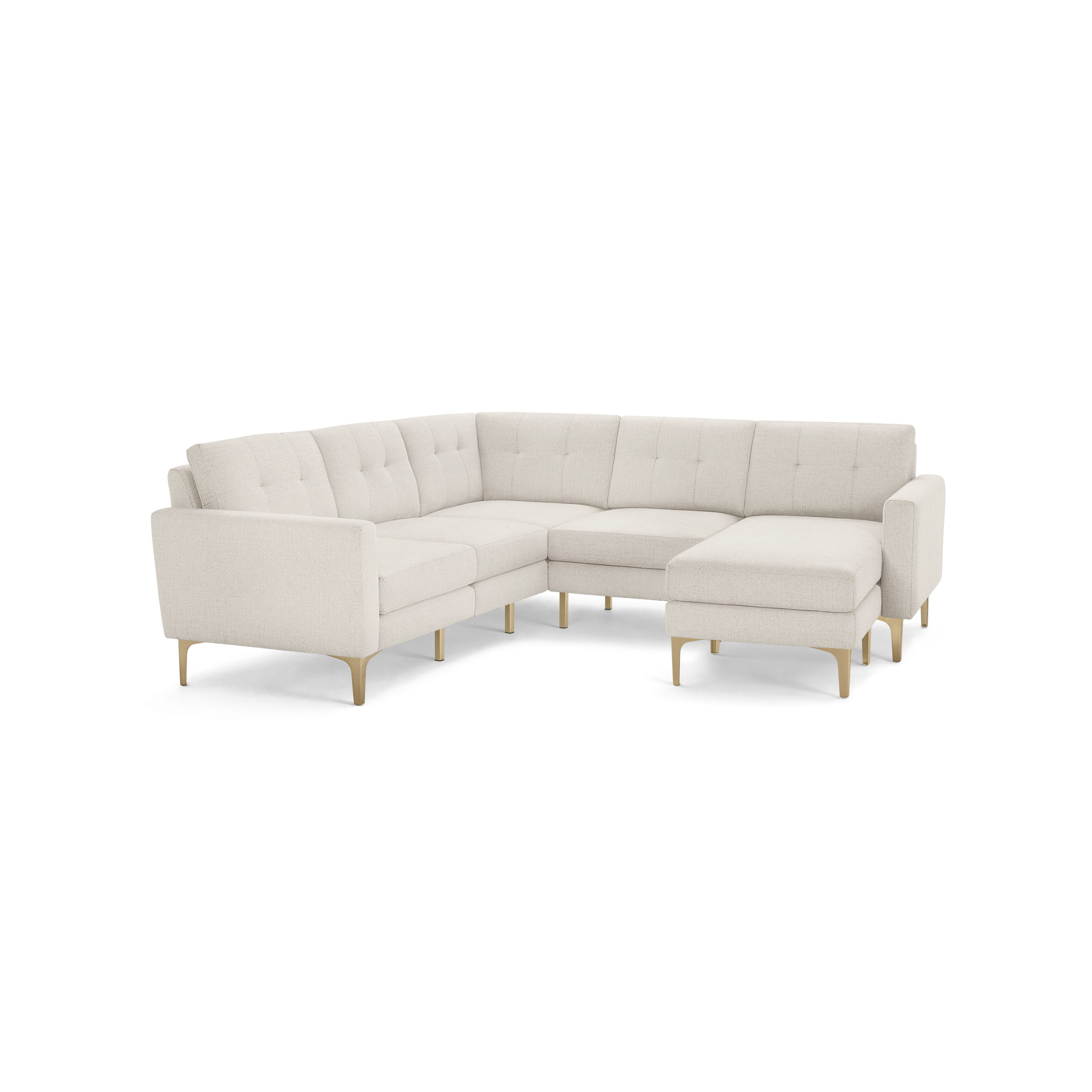 Modern L-shaped sectional sofa in light beige fabric with tufted back cushions and wooden tapered legs.