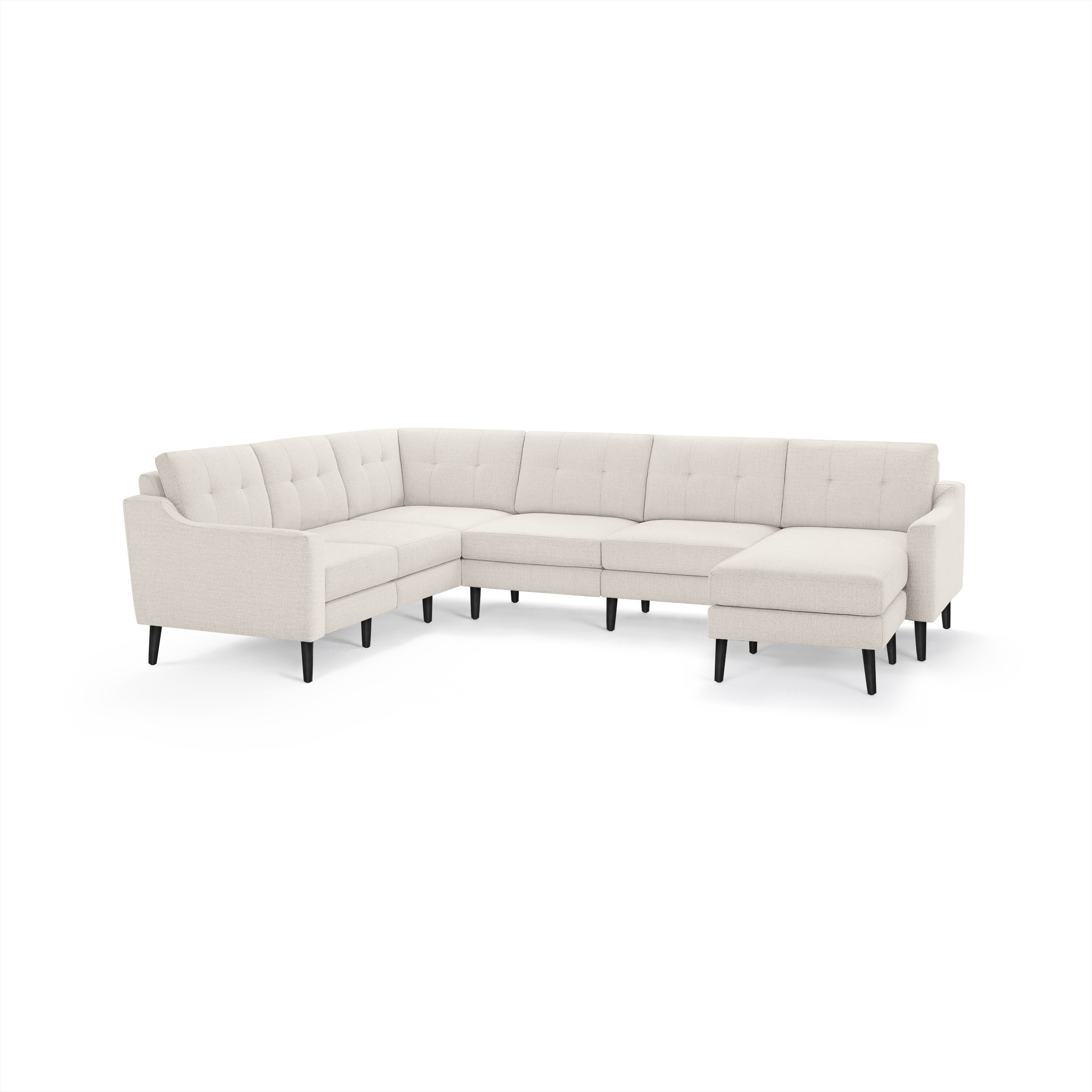 Beige fabric upholstered L-shaped sectional sofa with tufted back cushions, armrests, and black wooden legs.