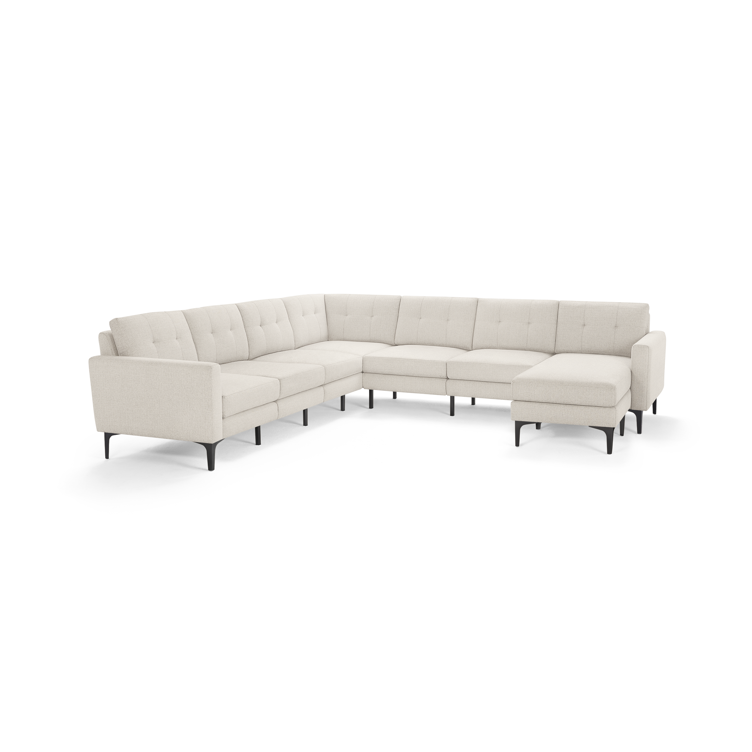 Modern beige L-shaped sectional sofa with tufted cushions and slim black metal legs, offering ample seating and a chaise lounge.