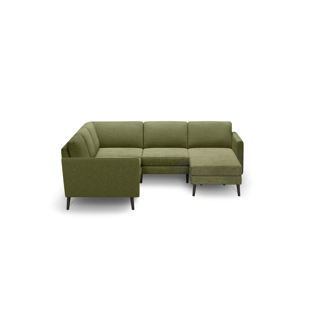 Olive green L-shaped sectional sofa with tufted cushions and wooden legs, featuring a chaise lounge on the right side.