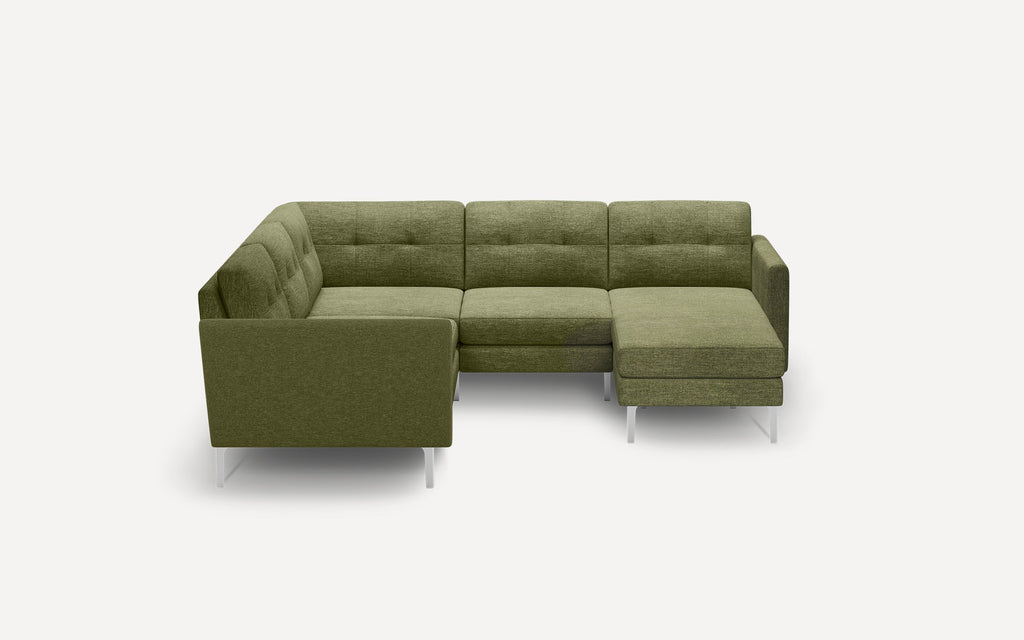 Modern L-shaped sectional sofa in olive green fabric with tufted cushions and sleek silver metal legs, set against a plain white background.